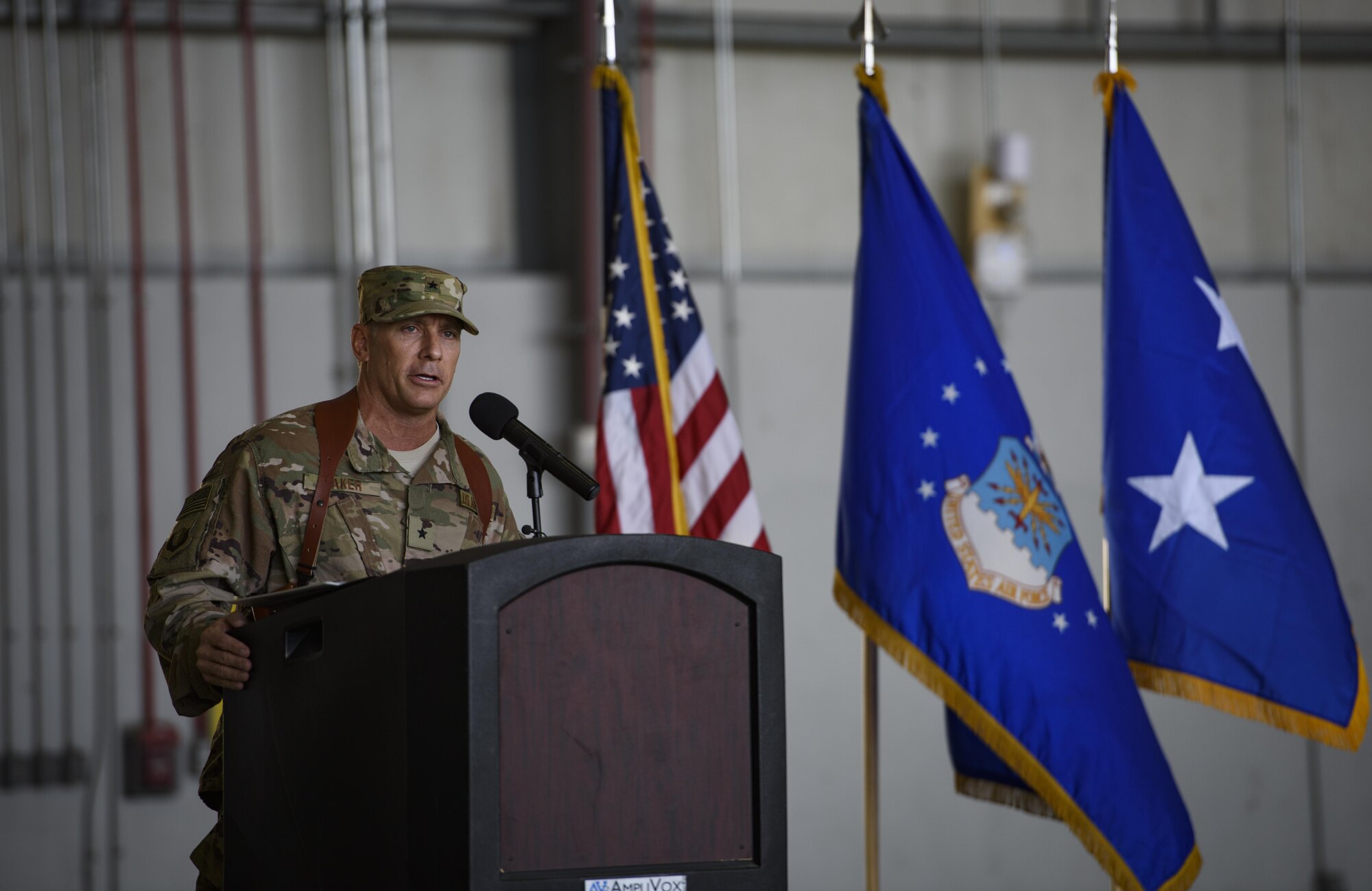 Brig. Gen. Craig Baker, the 455th Air Expeditionary Wing commander, speaks to 455th AEW Airmen and distinguished guests during a change of command ceremony at Bagram Airfield, Afghanistan, June 3, 2017. As the commander of the 455th AEW, Baker will lead the premier counterterrorism air mission in Afghanistan. The wing’s operations enable the NATO Resolute Support mission to successfully train, advise, and assist the military and security forces of Afghanistan, while restricting and deterring the terrorist threat in the region. (U.S. Air Force photo by Staff Sgt. Benjamin Gonsier)