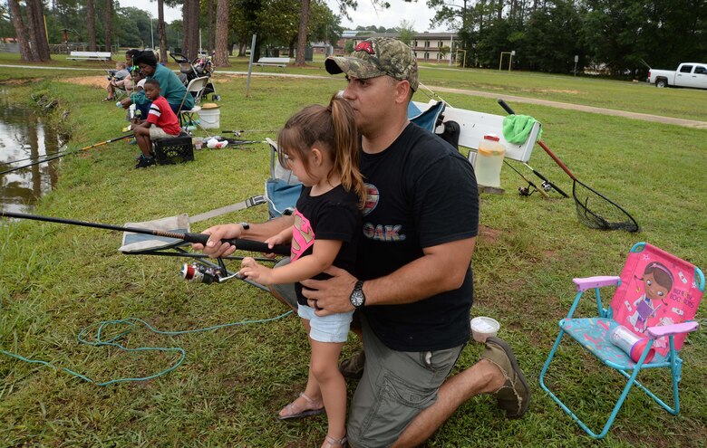 Three-year old Kinsley Snider catches three “monster” fish at Marine Corps Logistics Base Albany’s annual Buddy Fishing Tournament, June 3. Kinsley’s 10.1 pound catfish, earned her a trophy for the largest fish in her age category. The event, which is held at the installation’s Covella Pond, is opened to the communities’ youngest anglers and their fishing buddies.
