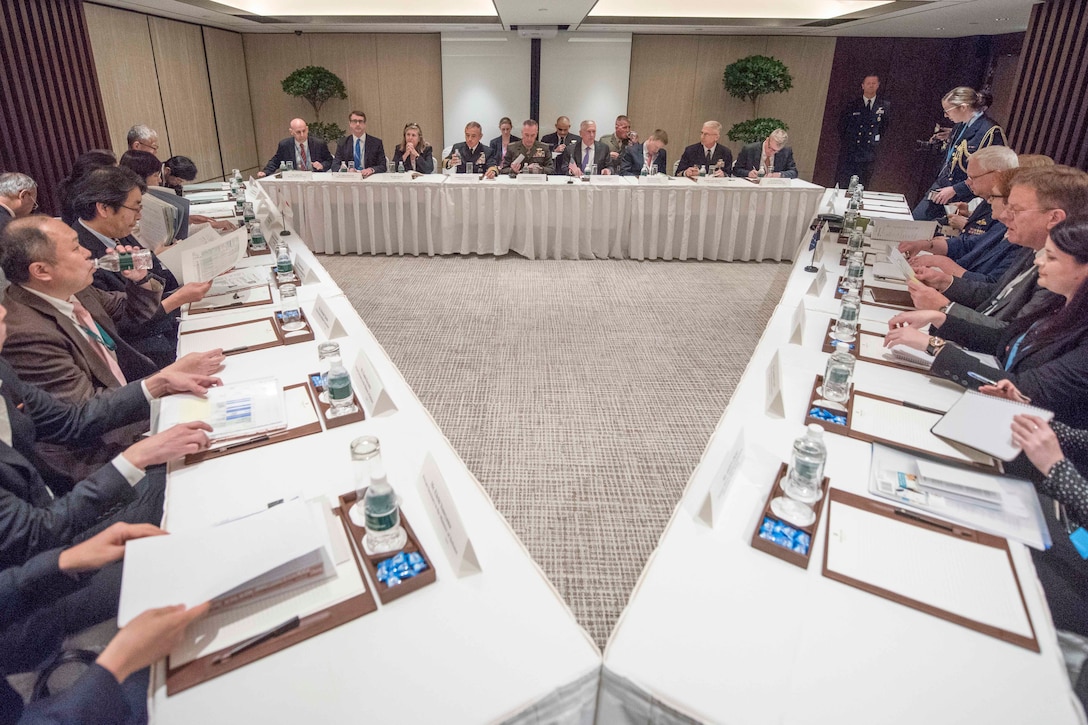 Defense Secretary Jim Mattis and Marine Corps Gen. Joe Dunford, chairman of the Joint Chiefs of Staff, meet with members of the Australian and Japan Defense delegation during the Shangri-La Dialogue in Singapore, June 3, 2017. DoD photo by Navy Petty Officer 2nd Class Dominique A. Pineiro