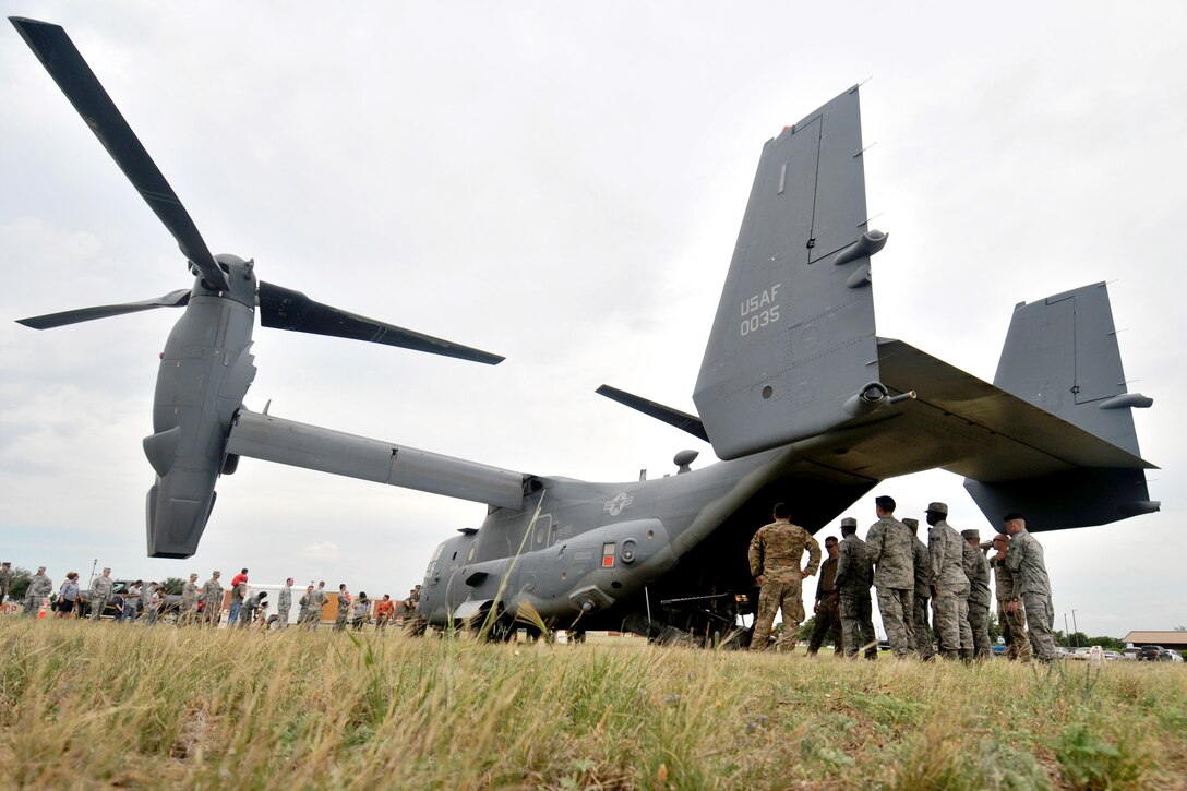 17th Training Wing students tour a CV-22 Osprey assigned to the 20th Special Operations Squadron, Goodfellow Air Force Base, Texas, May 30, 2017. The aircraft landed on Goodfellow after travelling from Cannon Air Force Base, New Mexico to provide Goodfellow students with an orientation on special operations missions and aircraft they may support after graduation. (U.S. Air Force photo by Airman 1st Class Randall Moose/Released)