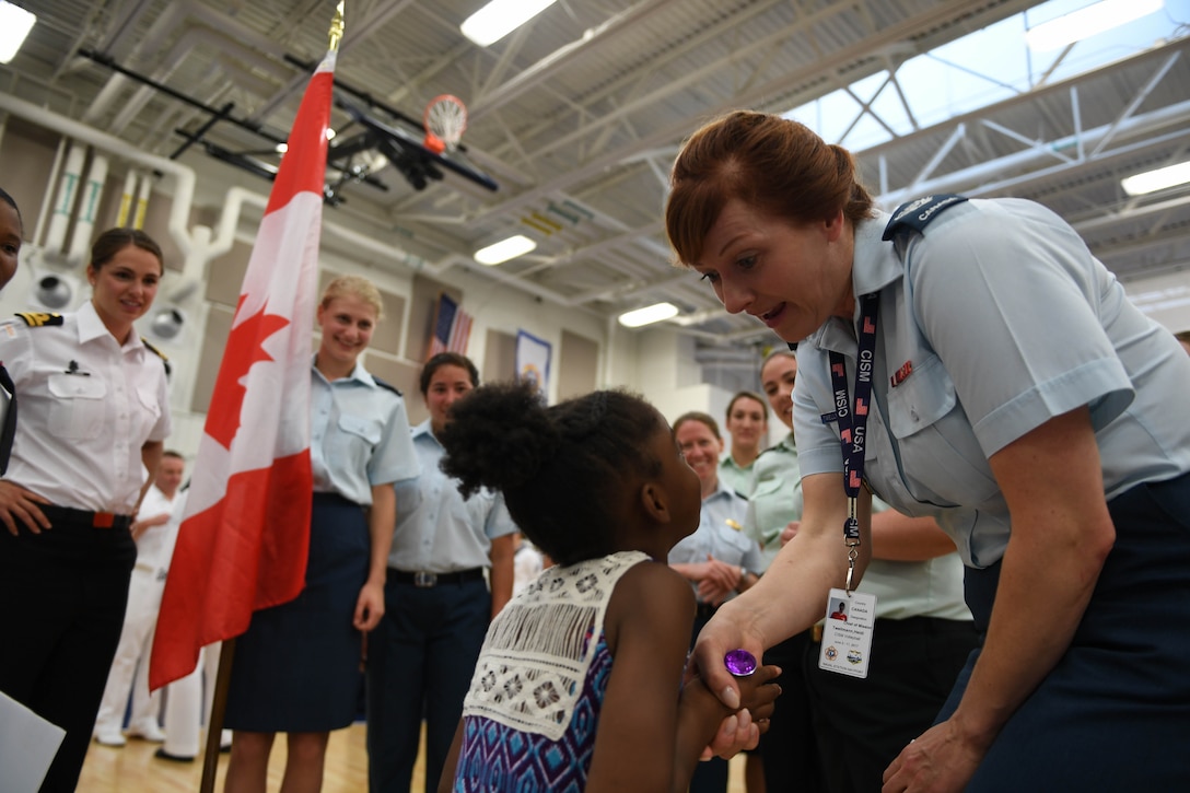 170603-N-UK306-201 JACKSONVILLE, Fla. (June 3, 2017)  Compeititors take part in the opening ceremony of the 18th Conseil International du Sport Militaire (CISM) World Military Women's Volleyball Championship at Naval Station Mayport.  Teams from the United States, Canada, China, Germany and The Netherlands will compete June 4-9, while promoting peace activities and solidarity among athletes. (U.S. Navy photo by Mass Communication Specialist 2nd Class Timothy Schumaker/Released)