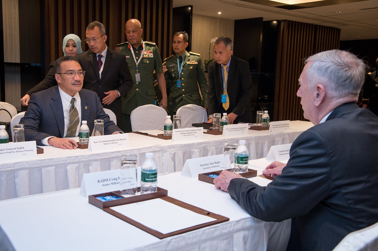Defense Secretary Jim Mattis, right, meets with Malaysian Defense Minister Hishammuddin Tun Hussein during the 16th Shangri-La Dialogue Asia security summit in Singapore, June 4, 2017. DoD photo by Air Force Staff Sgt. Jette Carr
