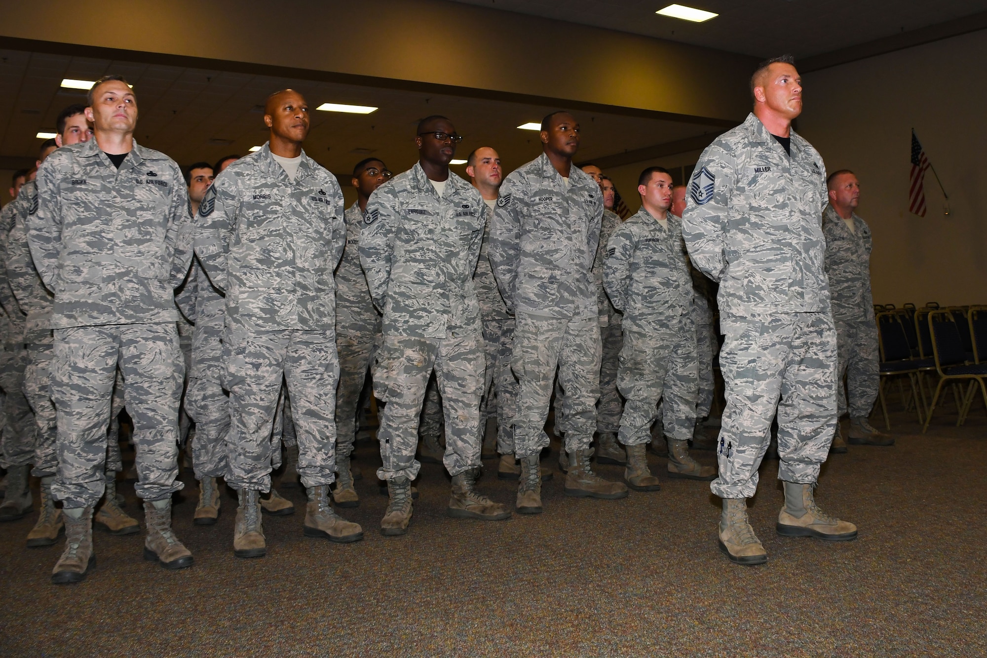 Airmen of the 307th Aircraft Maintenance Squadron listen intently to a speech given by U.S. Air Force Maj. Michael Maise, 307th AMXS commander, during a change of command ceremony at Barksdale Air Force Base, La., June 3, 2017.  Maise, who has been with the unit since 2012, took command of it during the ceremony.   He enlisted in the Air Force in 1995 and gained his commission in 2001.  After 12 years of active duty, Maise moved over to the Air Force Reserve. (U.S. Air Force photo by Tech. Sgt. Ted Daigle/Released)