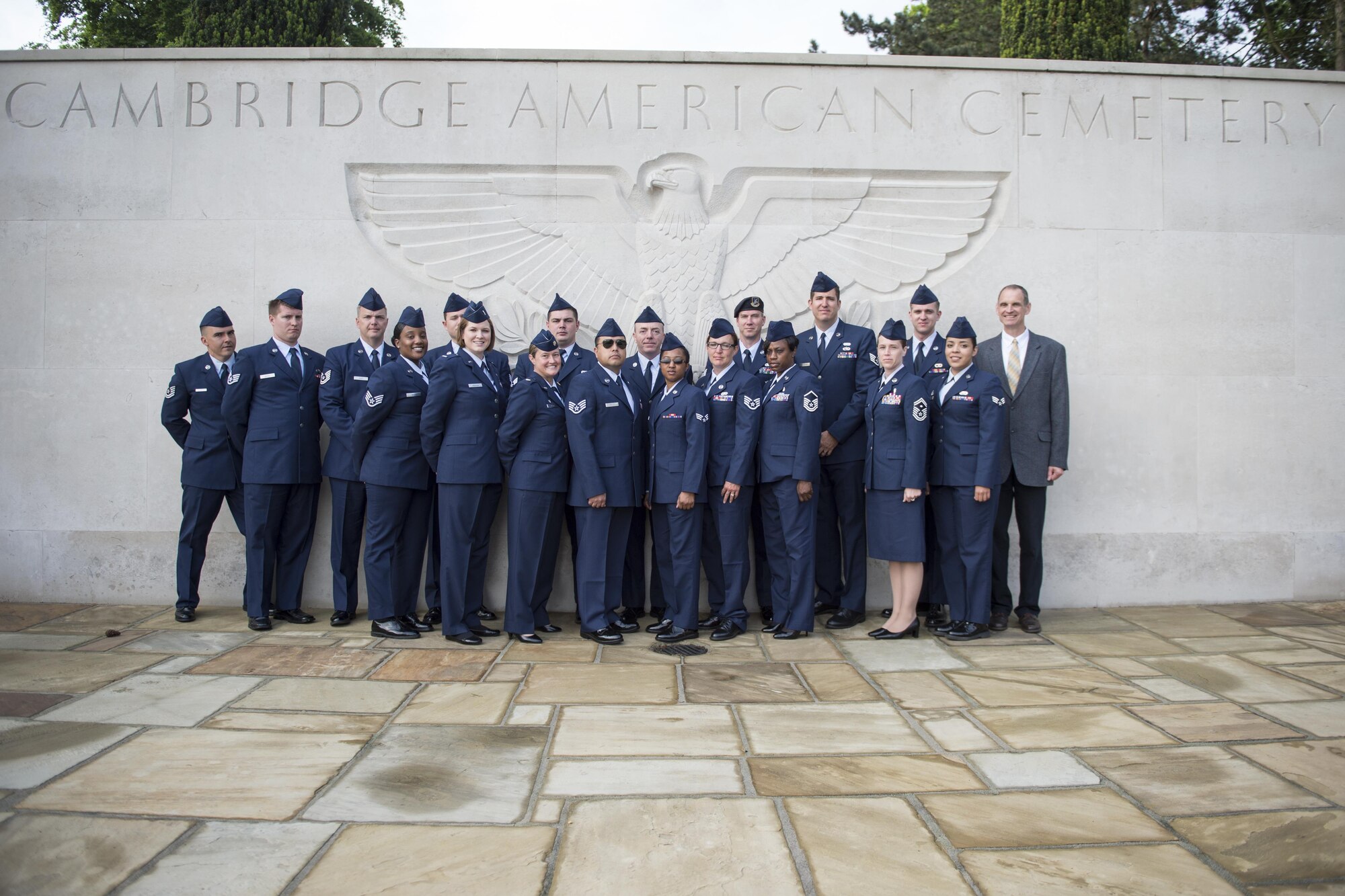 Members of the 434th Air Refueling Wing from Grissom Air Reserve Base, Ind. pose for a photo prior to a Memorial Day celebration at the Cambridge American Cemetery in Cambridge, England May 29, 2017. The cemetery is the final resting place of 3,812 men and women who died in and around Great Britain during World War II. (U.S. Air Force photo/Tech. Sgt. Benjamin Mota)