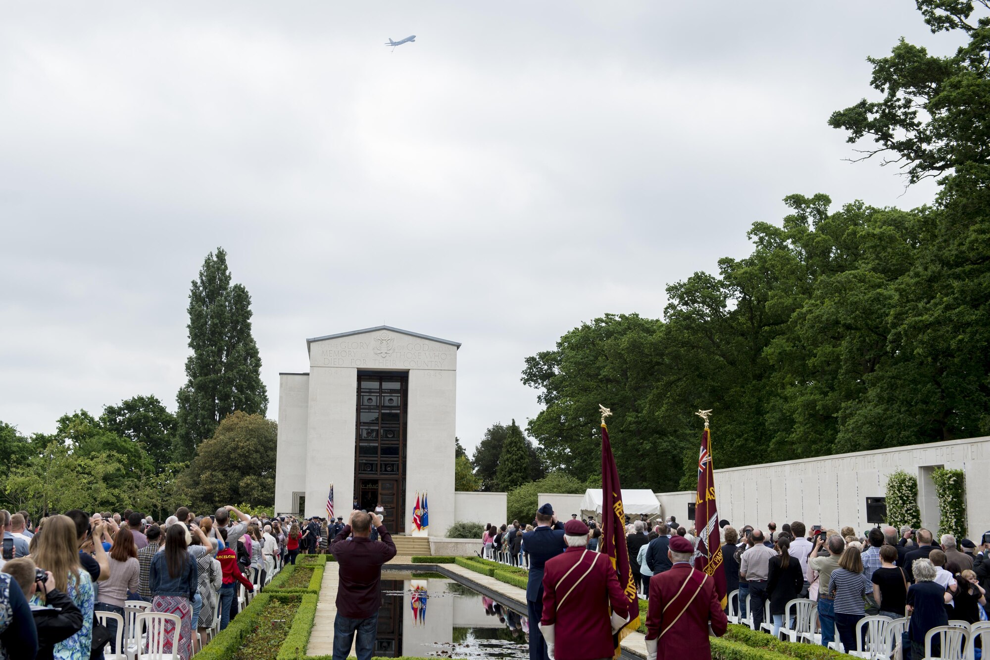 A 434th Air Refueling Wing KC-135R Stratotanker from Grissom Air Reserve Base, Indiana flies over a Memorial Day celebration at the Cambridge American Cemetery in Cambridge, England May 29, 2017. The cemetery is also home to the Wall of the missing that contains names of 5,127 Americans, whose bodies were never recovered. (U.S. Air Force photo/Tech. Sgt. Benjamin Mota)