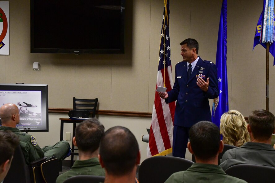 U.S. Air Force Lt. Col. John P. Booker speaks as the commander of the 343rd Bomb Squadron for the first time during a change of command ceremony on Barksdale Air Force Base, La. June 3, 2017. Booker is a command pilot with over 4,700 flight hours. (U.S. Air Force photo by Master Sgt. Dachelle Melville/Released)