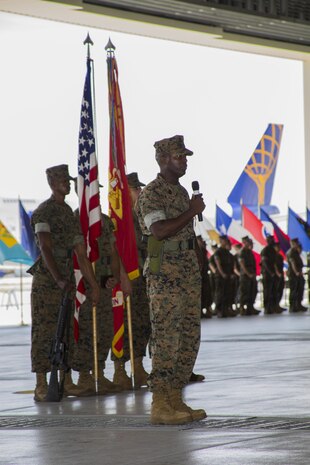 U.S. Marine Corps Sgt. Maj. Darnell Richardson, outgoing Headquarters and Headquarters Squadron (H&HS) sergeant major, speaks to guests during a relief and appointment ceremony at Marine Corps Air Station Iwakuni, Japan, June 2, 2017. The relief and appointment ceremony was held to welcome the incoming and see off the outbound sergeant major. (U.S. Marine Corps photo by Lance Cpl. Joseph Abrego)