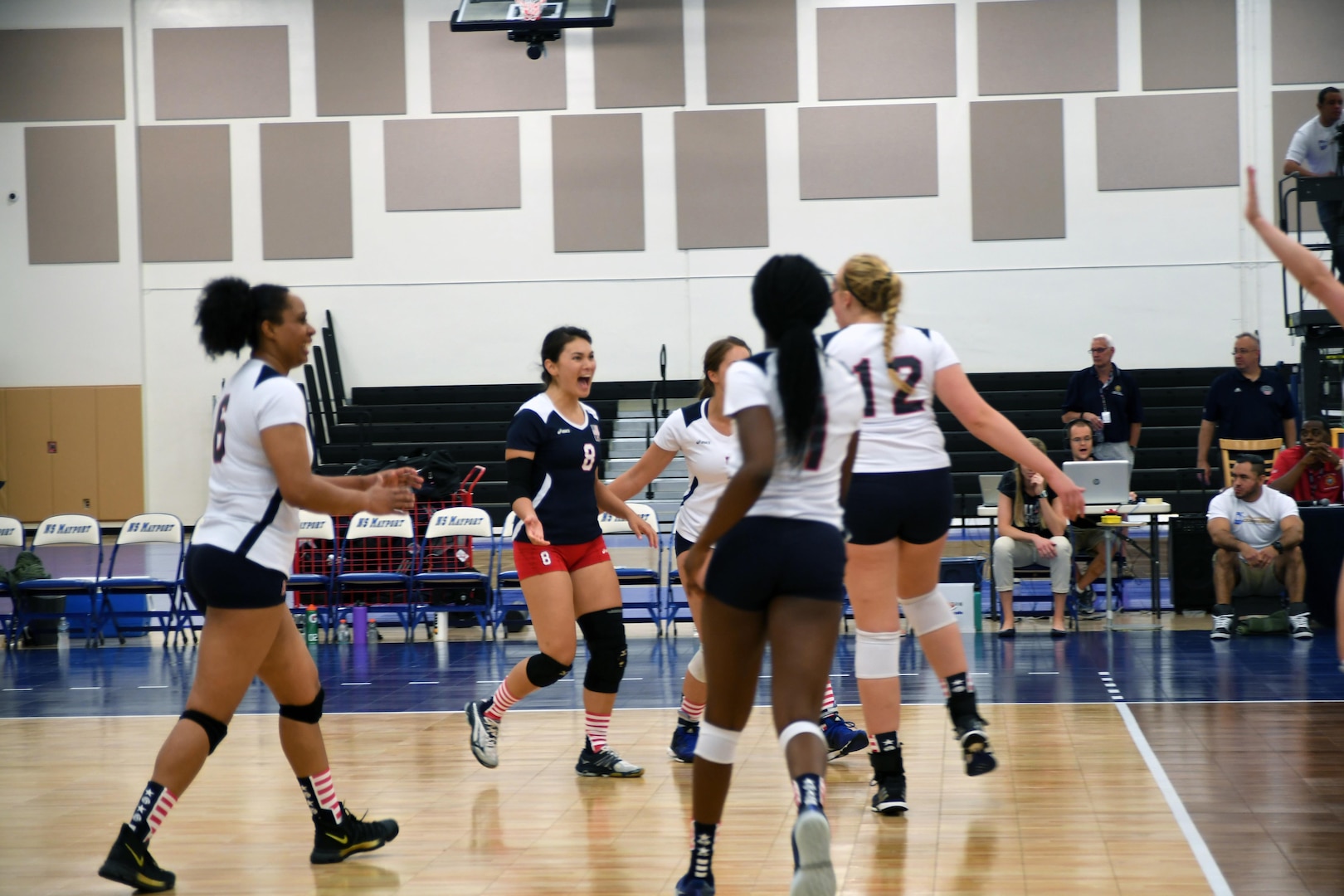 U.S. Armed Forces Women's Volleyball team celebrate a point against China in match 1 of the 18th Conseil International du Sport Militaire (CISM) World Women's Military Volleyball Championship at Naval Station Mayport, Florida on 4 June 2017. Mayport is hosting the CISM Championship from 2-11 June.  Finals are on 9 June.