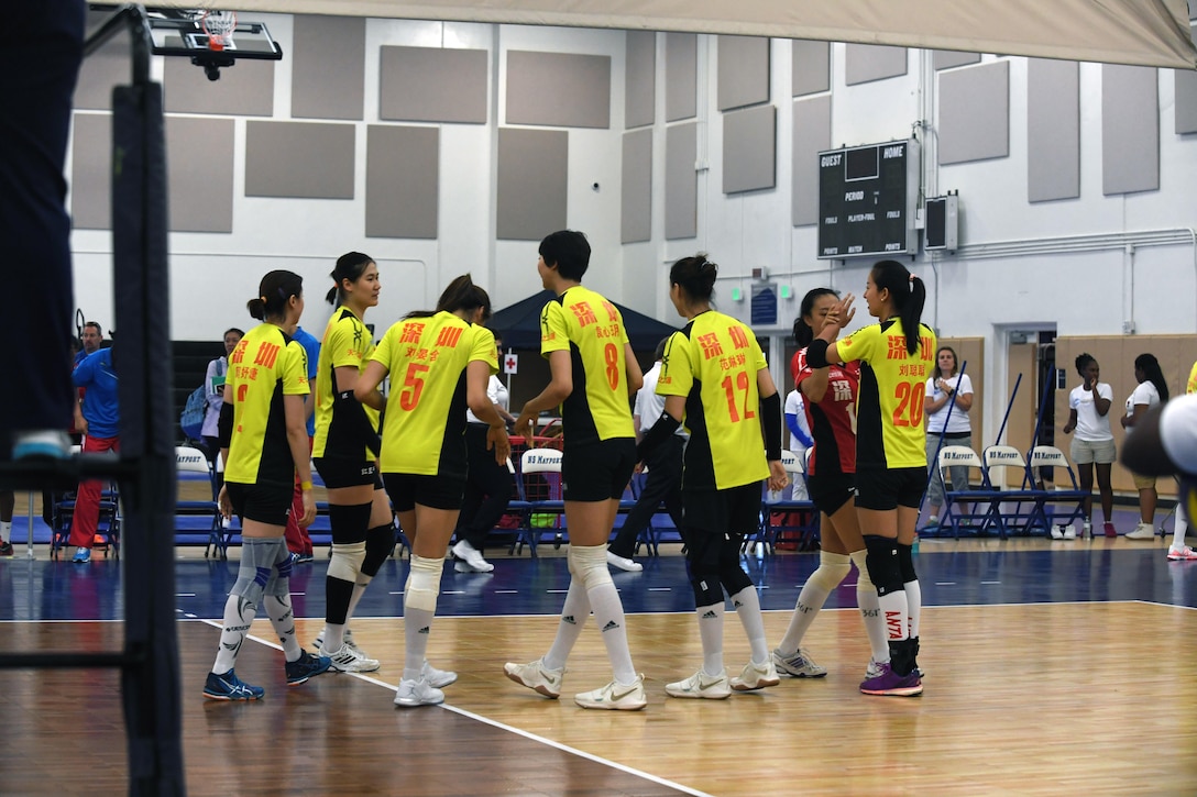 Chinese Women's Volleyball Team celebrates their victory over USA in match 1 of the 18th Conseil International du Sport Militaire (CISM) World Women's Military Volleyball Championship at Naval Station Mayport, Florida on 4 June 2017. Mayport is hosting the CISM Championship from 2-11 June.  Finals are on 9 June.