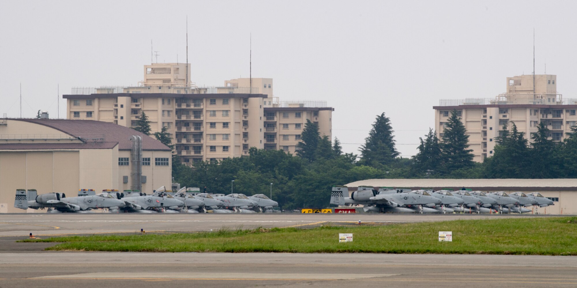 Fourteen A-10 Thunderbolt IIs assigned to the 25th Fighter Squadron, Osan Air Base, Republic of Korea sit on the flightline at Yokota Air Base, Japan, May 27, 2017. (U.S. Air Force photo by Yasuo Osakabe)
