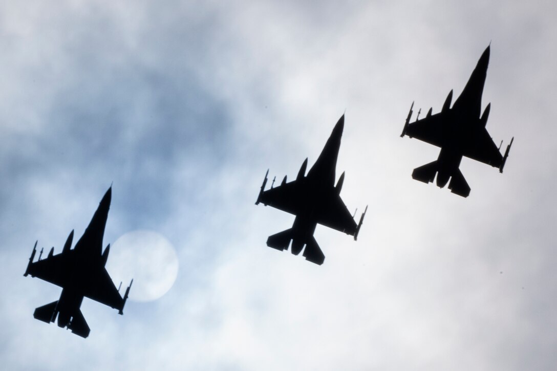 Three F-16 Fighting Falcons assigned to the 36th Fighter Squadron, Osan Air Base, Republic of Korea, fly over Yokota Air Base, Japan, June 1, 2017. Fifteen F-16s landed at Yokota en route to Alaska to participate in exercise Red Flag.  (U.S. Air Force photo by Yasuo Osakabe/Released)