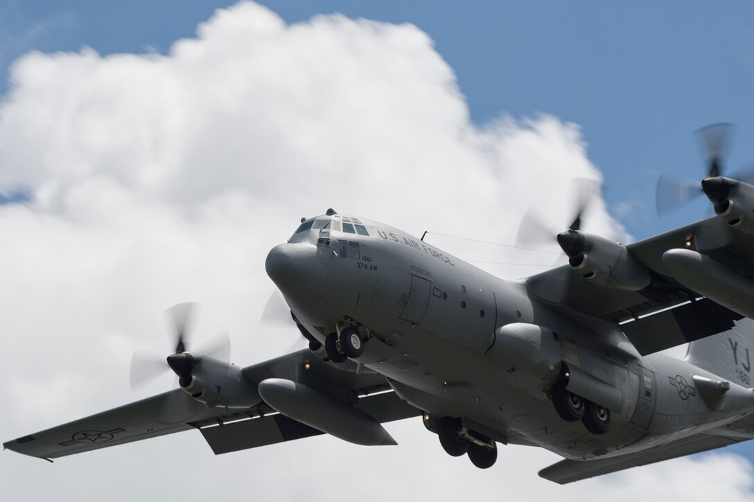 A C-130H Hercules from the 36th Airlift Squadron flies over Yokota Air Base, Japan, June 1, 2017 during a training mission. The C-130 provides tactical airlift worldwide and its flexible design allows it to operate in austere environments. (U.S. Air Force photo by Yasuo Osakabe)