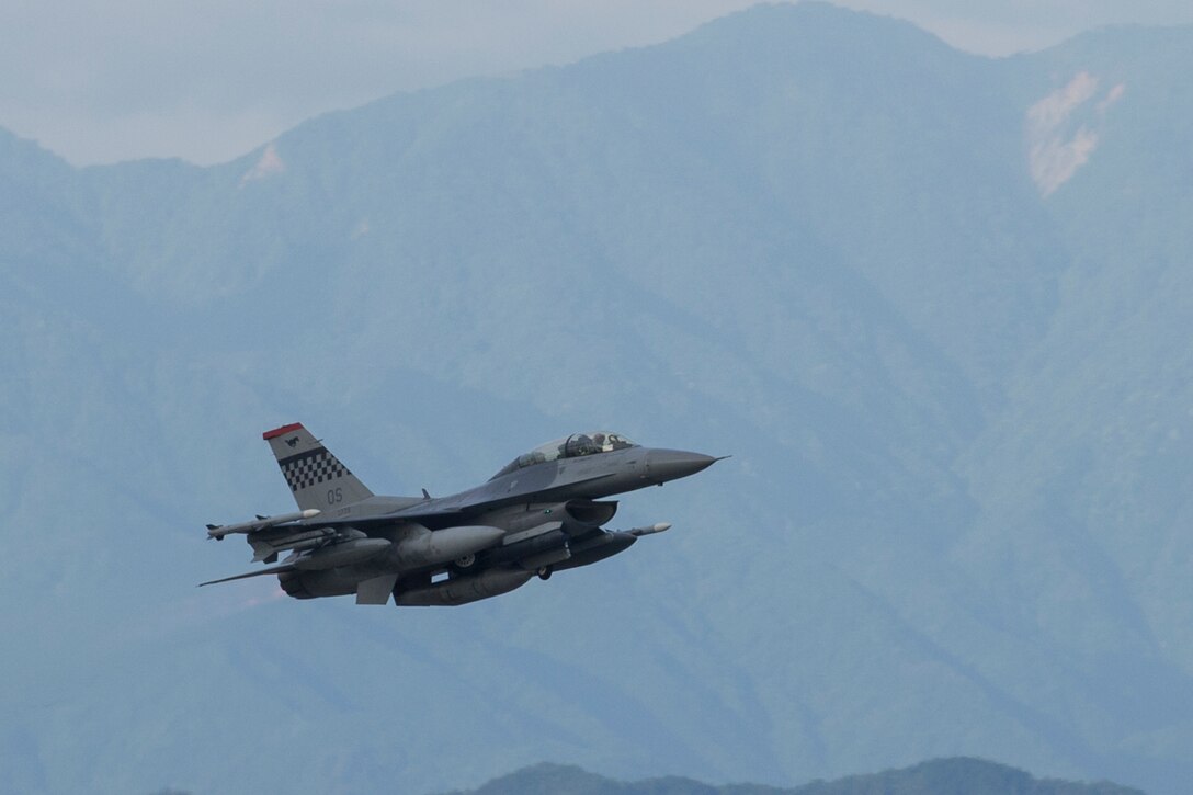 An F-16 Flighting Falcon assigned to the 36th Flighting Squadron, Osan Air Base, Republic of Korea takes off at Yokota Air Base, Japan, June 4, 2017. Fifteen F-16s transited to Yokota en route to Alaska. (U.S. Air Force photo by Yasuo Osakabe)