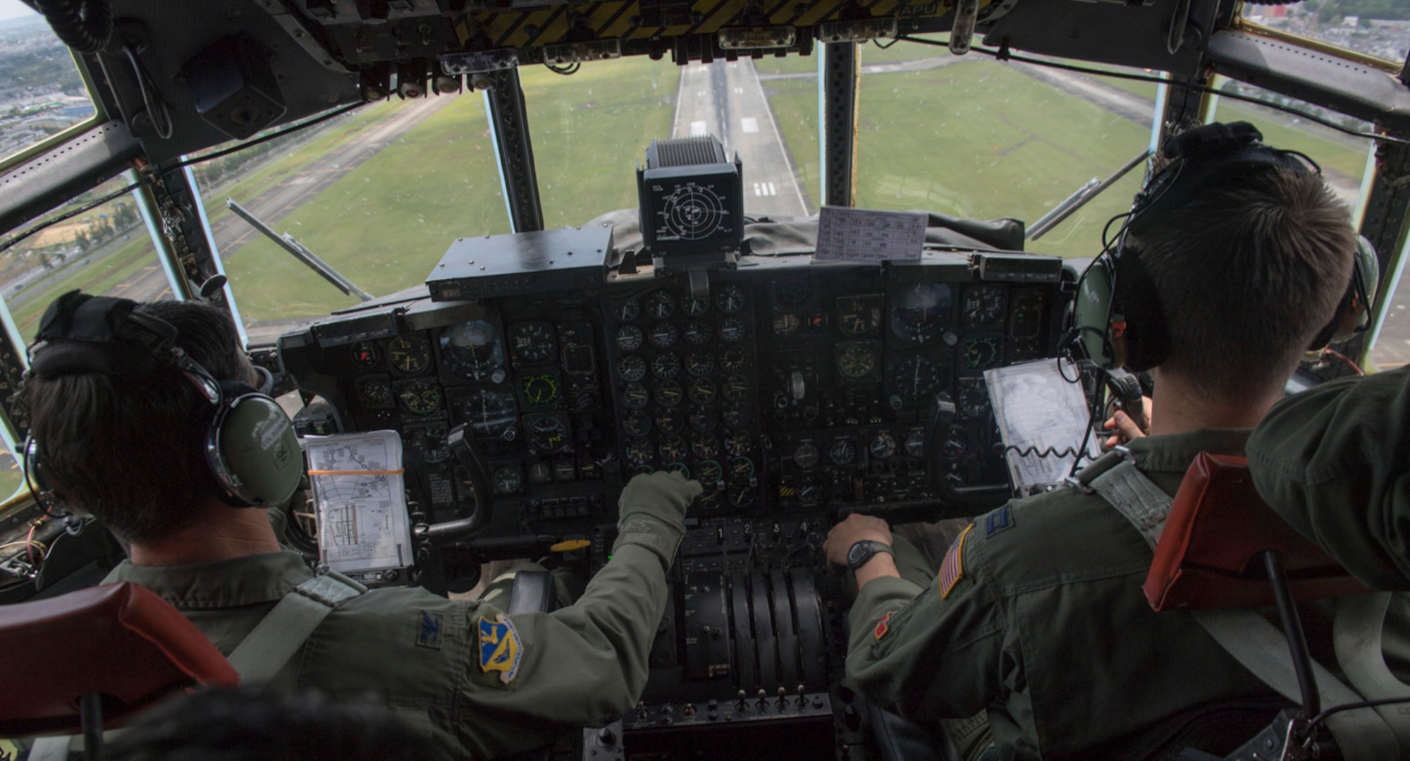 Col. Robert L. Dotson, 374th Operations commander, prepares to land a C-130H Hercules, June 2, 2017, at Yokota Air Base, Japan. The landing marked the end of Dotson's final flight in Yokota. (U.S. Air Force photo by Airman 1st Class Juan Torres)