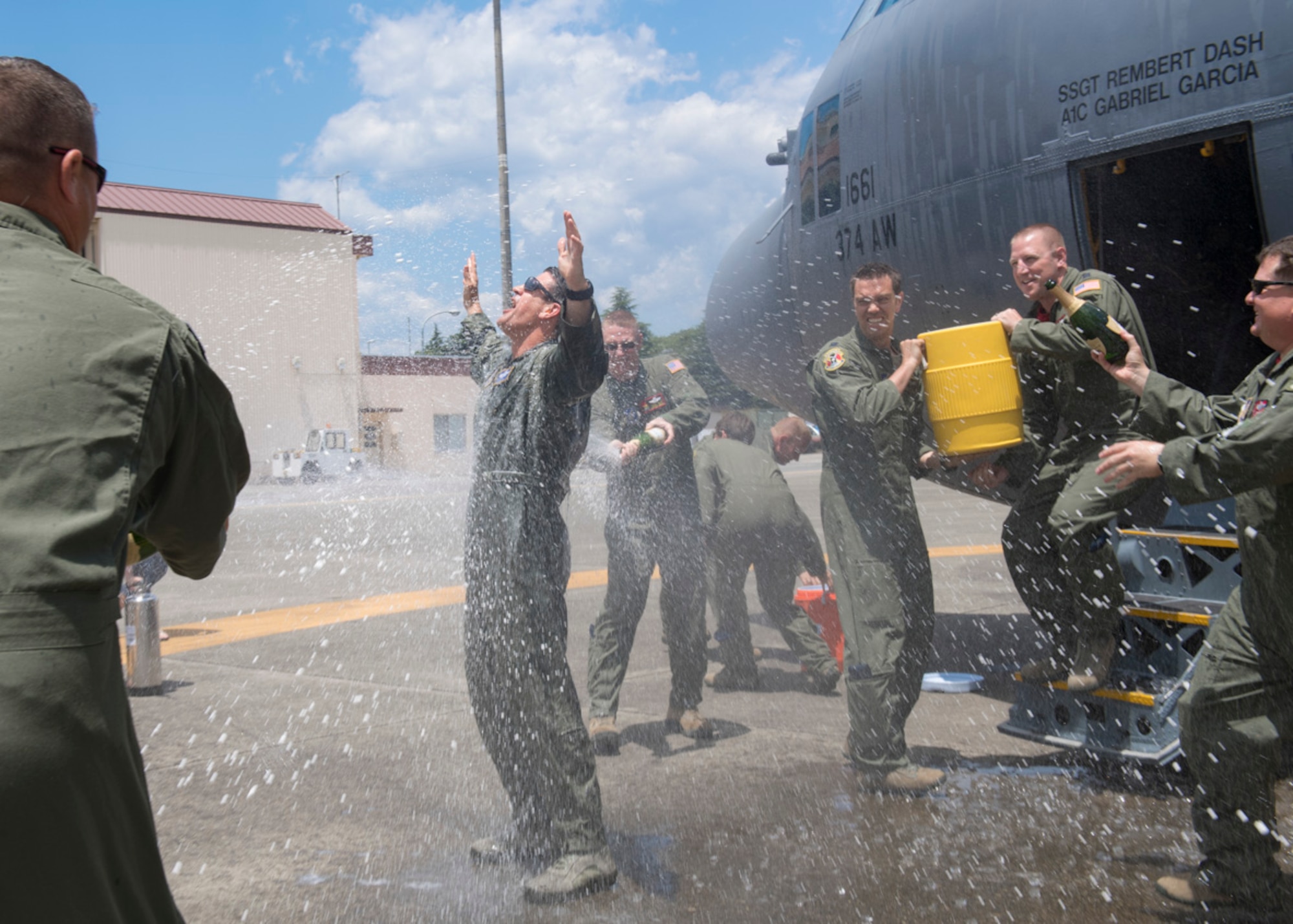 Col. Robert L. Dotson, 374th Operations commander, celebrates the end of his final flight, June 2, 2017, at Yokota Air Base, Japan. After his landing, Dotson is greeted by group comrades, family and friends. (U.S. Air Force photo by Airman 1st Class Juan Torres)