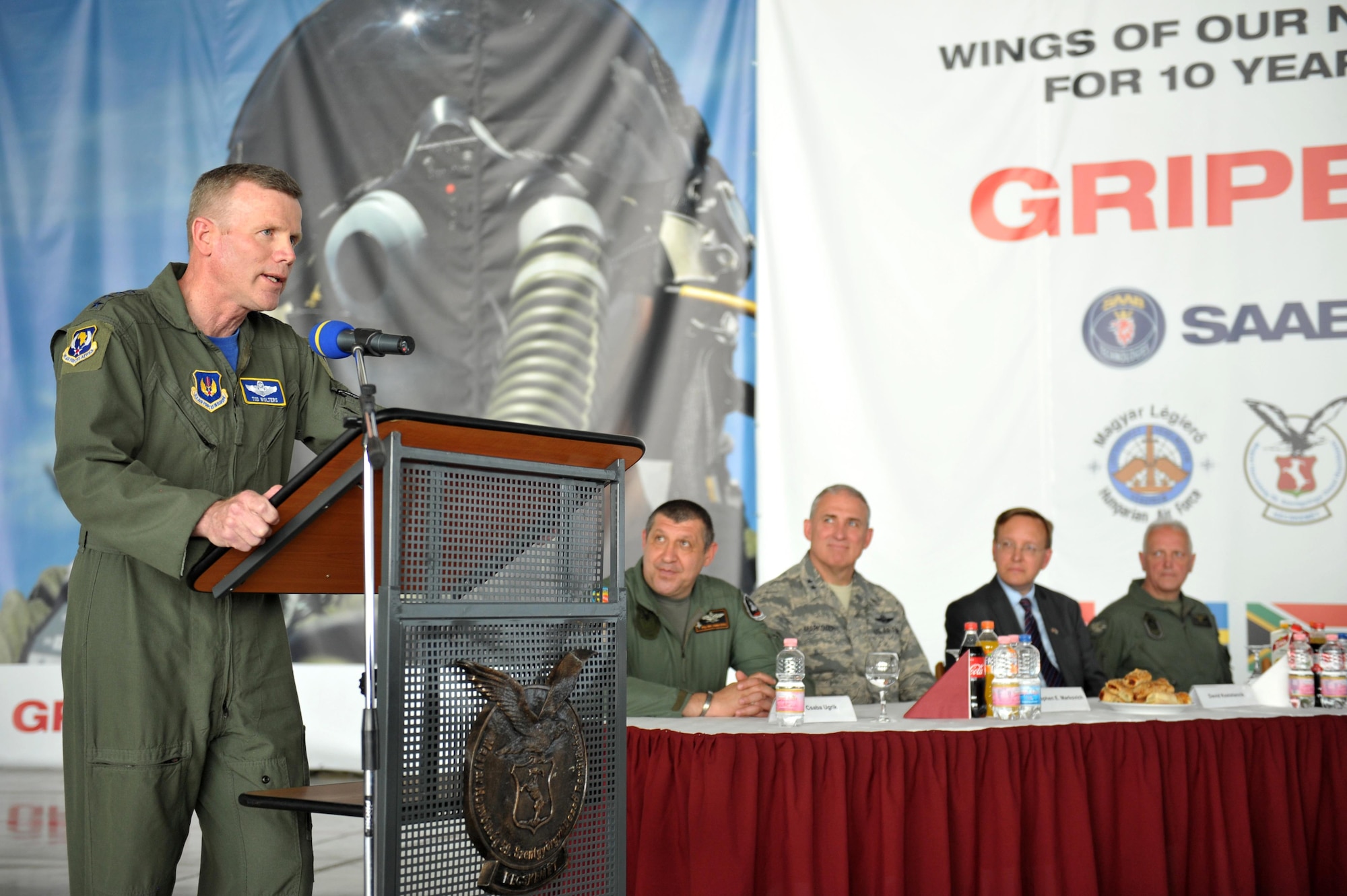 Brig. Gen. Csaba Ugrik, commander of 59th Air Base, Brig. Gen. Stephen Markovich, commander of the Ohio Air National Guard, and Mr. David Kostelancik, chargé d’ affaires for the U.S. Embassy in Hungary, listen as Gen. Tod Wolters speaks during a ceremony June 2, in Kecskemét, Hungary. Approximately 400 military members from the United States, Hungary, Croatia, Slovakia, Slovenia and Czech Republic, including 200 Airmen from the Ohio National Guard, are participating in the largest air-to-air and air-to-ground exercise in Hungary, focused on conducting military-to-military engagements, interoperability and maintaining joint readiness.