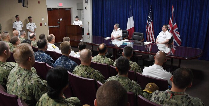 MANAMA, Bahrain (June 1, 2017) Vice Adm. Kevin M. Donegan, commander of U.S. Naval Forces Central Command, delivers remarks to the audience before signing an agreement to increase coordination for anti-submarine warfare activities between the France, the U.S. and the United Kingdom. The agreement follows the signing of a trilateral cooperation agreement by the Chief of Naval Operations Adm. John Richardson, the First Sea Lord of the United Kingdom Adm. Sir Philip Jones and French Chief of Naval Staff Adm. Christophe Prazuck in London on March 27. (U.S. Navy photo by Mass Communications Specialist 2nd Class Victoria Kinney/Released) 