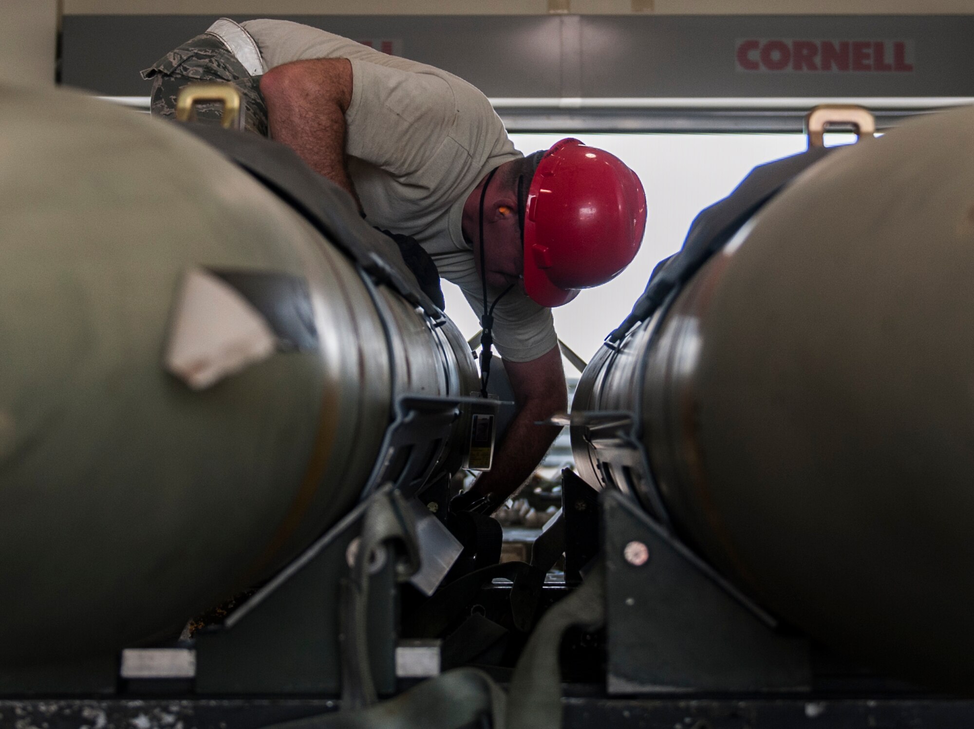 U.S. Air Force Staff Sgt. Shawn Monteer, 8th Maintenance Squadron conventional maintenance crew member, secures bolts of the tail wing on a Guided Bomb Unit 31 version 3 during the Combat Ammunition Production Exercise at Kunsan Air Base, Republic of Korea, June 5, 2017. CAPEX provided an opportunity to evaluate total force integration, how well Airmen maintained Air Tasking Order requirements, receipt of munitions and the weapons breakdown process. (U.S. Air Force photo by Senior Airman Colville McFee/Released)