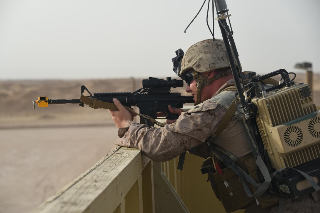 A Marine explosive ordnance disposal technician, with Special Purpose Marine Air Ground Task Force 17.2, Logistics Combat Element, Combat Logistics Detachment 1 EOD, provides overwatch for advancing EOD teams during a joint service EOD field training exercise at an undisclosed location in Southwest Asia, May 25, 2017. EOD teams from each of the four service branches, deployed to five different countries across the AOR, gathered for joint service EOD training, which allowed for the exchange of tactics, techniques and procedures between service branches. (U.S. Air Force photo/Tech. Sgt. Jonathan Hehnly)