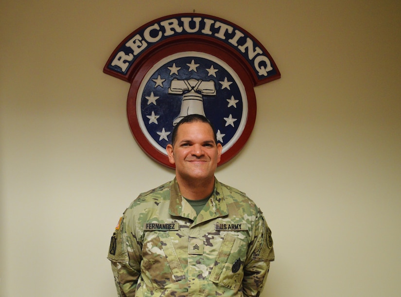 Sgt. Erick Fernandez, recruiter, Tempe Recruiting Company, poses for a photo at the Phoenix Recruiting Battalion headquarters, Phoenix, May 18. Fernandez, originally from Panama, moved to the United States at the age of 18 and joined the U.S. Army in 2005. (Photo by Alun Thomas, USAREC Public Affairs)
