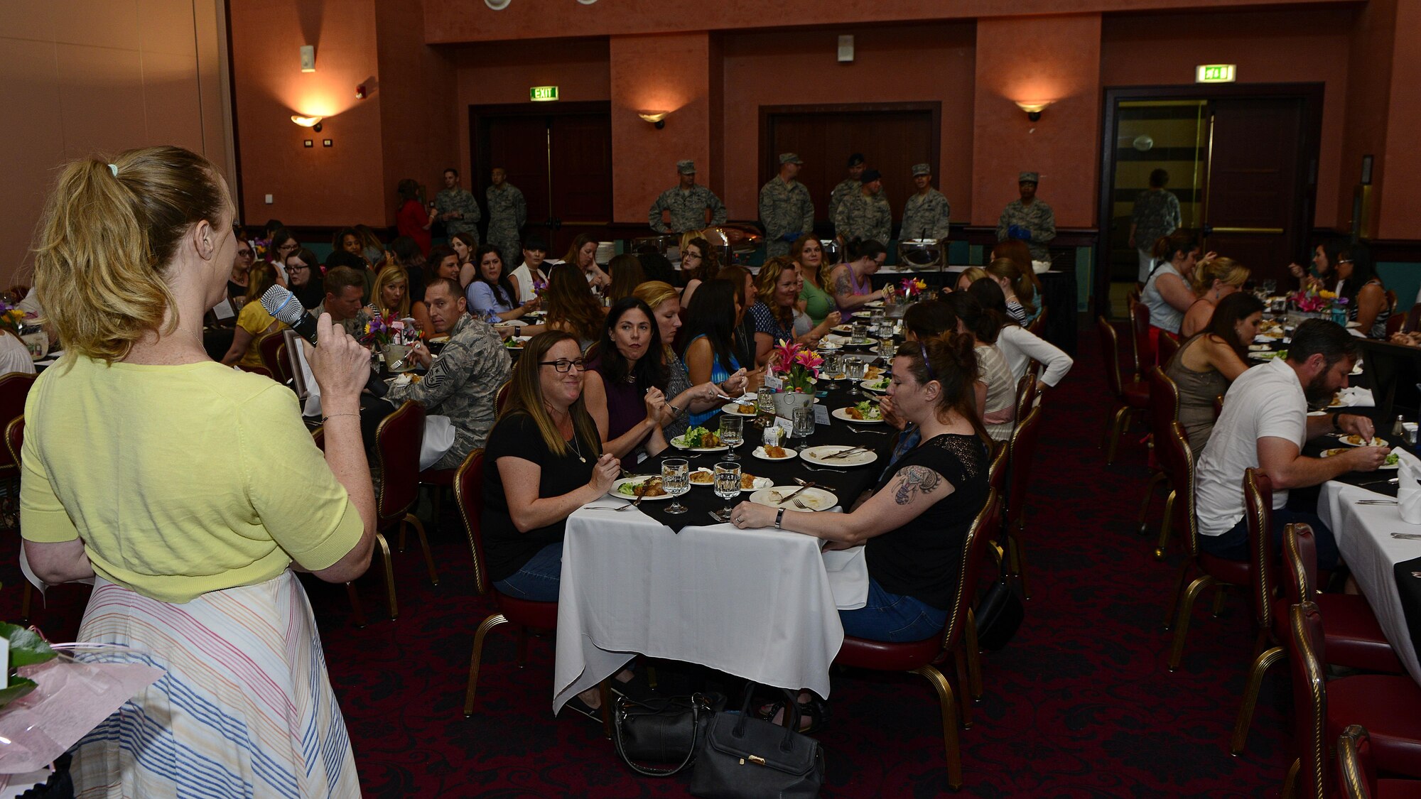 Deanna Dlugiewicz, Airman and Family Readiness Center director, speaks to attendees at a spouse appreciation lunch at Aviano Air Base, Italy, and June 1, 2017. Team Aviano spouses were recognized for the sacrifices they make for their Airmen and families. (U.S. Air Force photo by Airman 1st Class Ryan Brooks)
