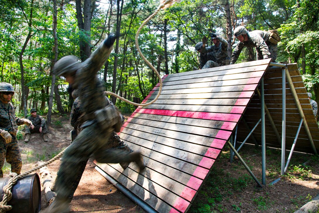 Marines and sailors participate in a small unit leadership building course at Camp Mujuk, South Korea, May 29, 2017. Marine Corps photo by Lance Cpl. Caleb T. Maher