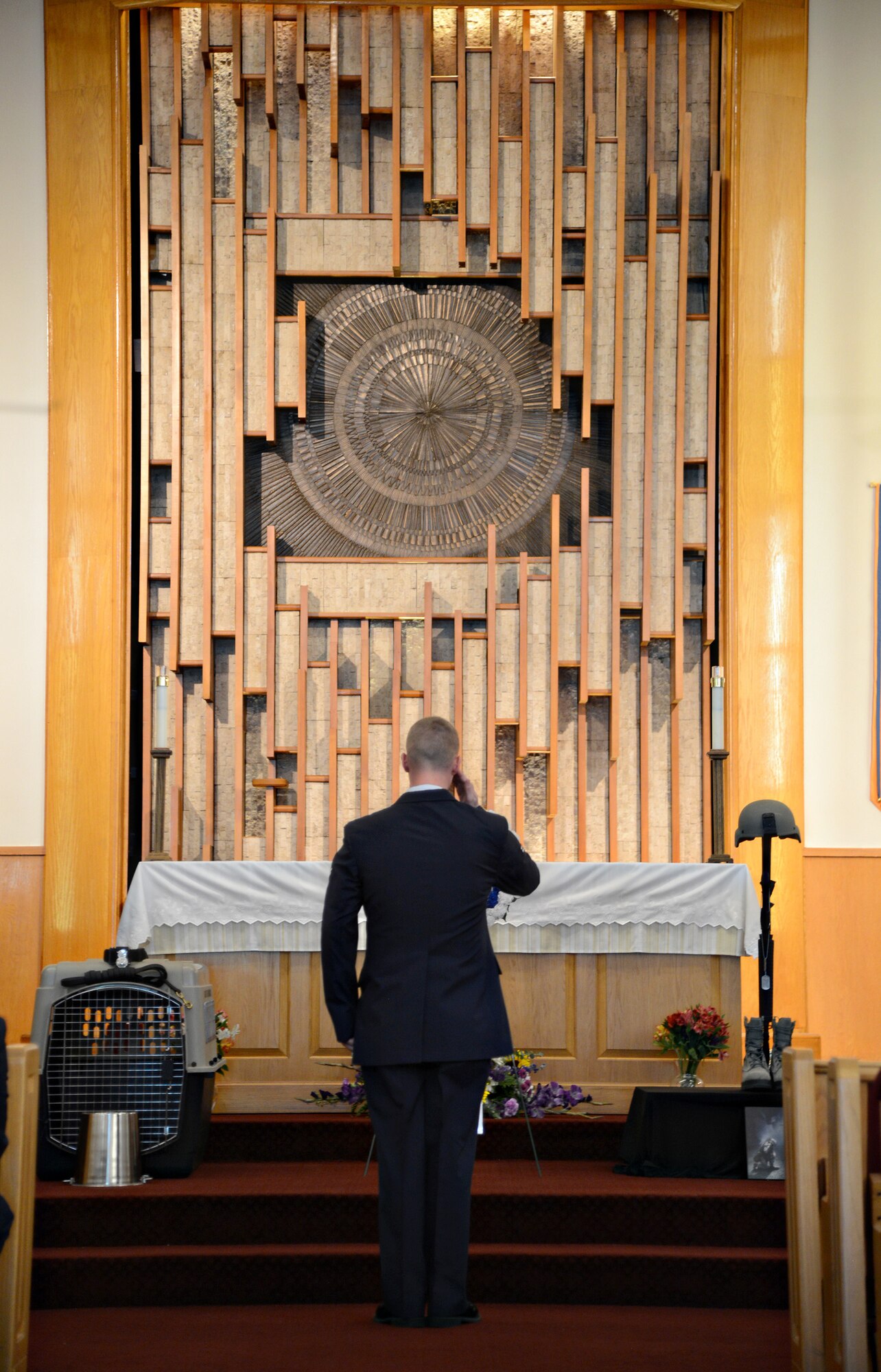 Members of the 72nd Security Forces Squadron’s Charlie Flight, including Airman 1st Class Ryan Walsh, pictured, read the names of 143 law enforcement officers, Airmen and Military Working Dogs killed in action in 2016 during the National Police Week’s memorial service at the Tinker Chapel May 15. (Air Force photo by Kelly White)