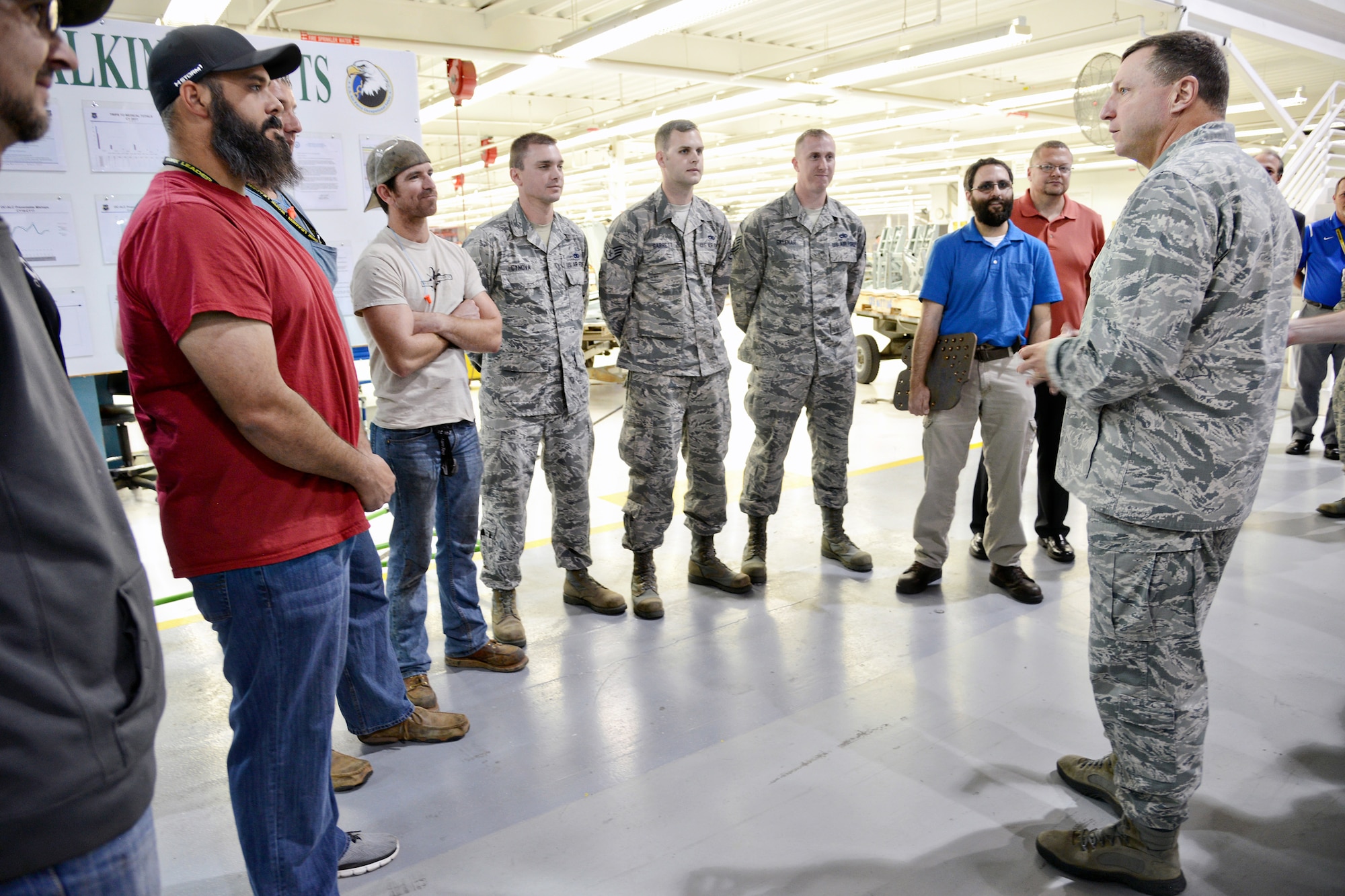 Oklahoma City Air Logistics Complex Commander Brig. Gen. Mark Johnson thanks members of the 564th Aircraft Maintenance Squadron, Air Force Life Cycle Management Center and the 76th AMXG’s Expeditionary Depot Maintenance Flight for working together to repair and recover a damaged KC-135 from Al Udeid Air Base, Qatar. (Air Force photo by Kelly White)