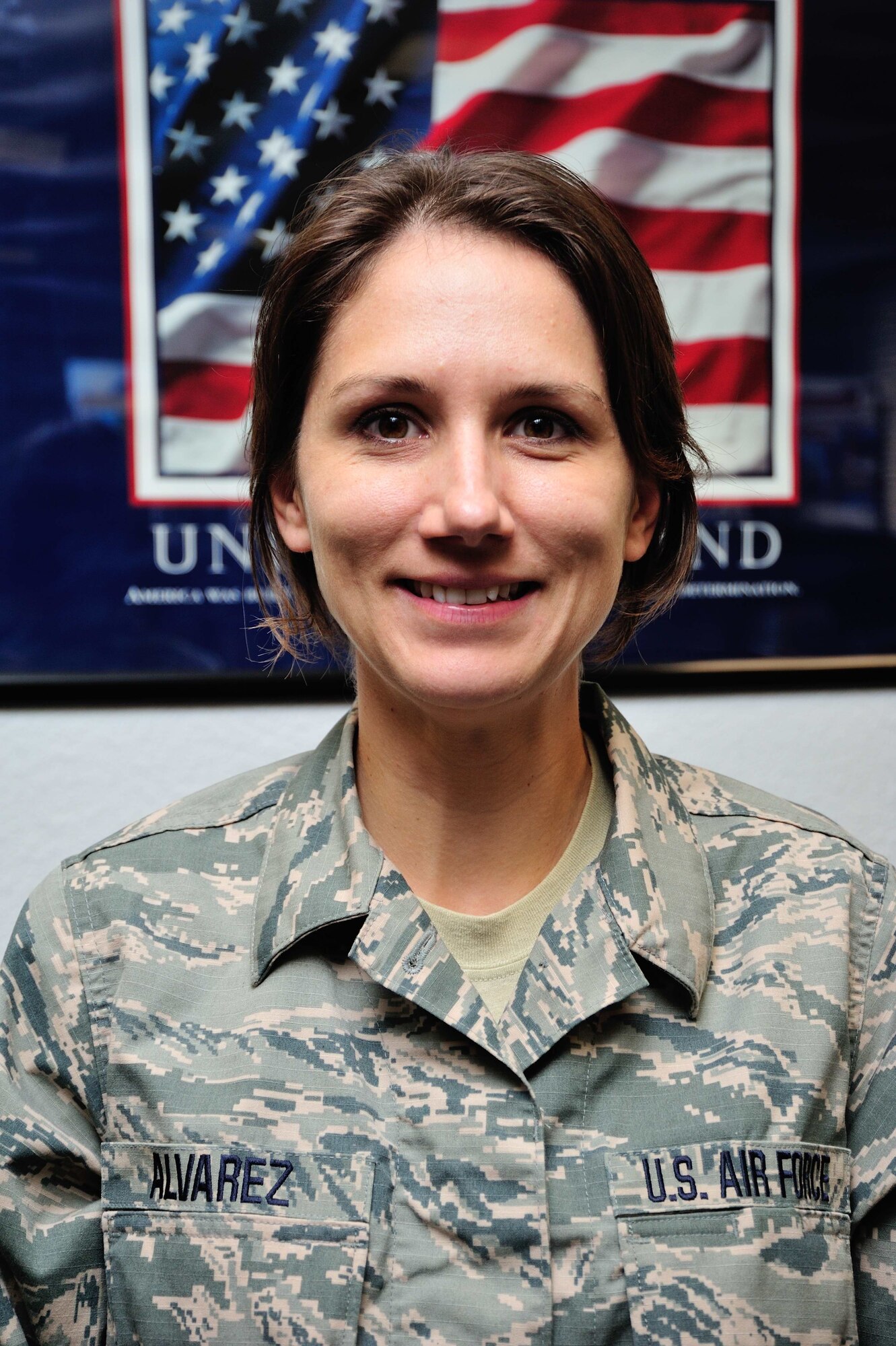 Tech. Sgt. Heather Alvarez, 403rd Wing education and training technician, assisted in alerting two residents to a fire that broken out in their home in Biloxi, Mississippi, May 2, 2017. Two other Keesler Air Force Base also arrived on the scene to help Alvarez ensure the two people made it safely out of the house. (U.S. Air Force photo/Tech. Sgt. Ryan Labadens)