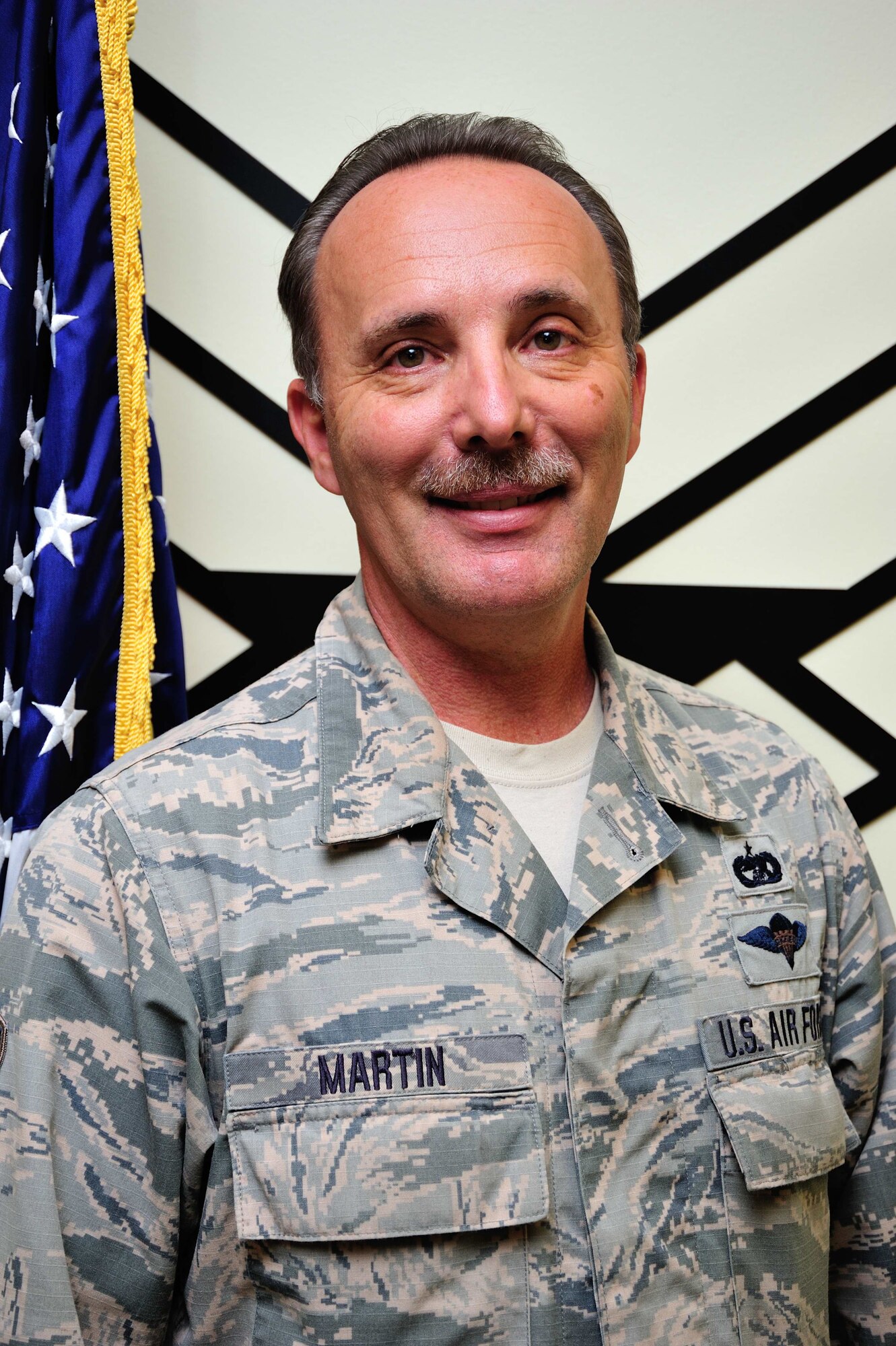 Master Sgt. Steve Martin, 41st Aerial Port Squadron aerial delivery manager, helped a women and her dog from her home, which had fire, April 6, 2017. 