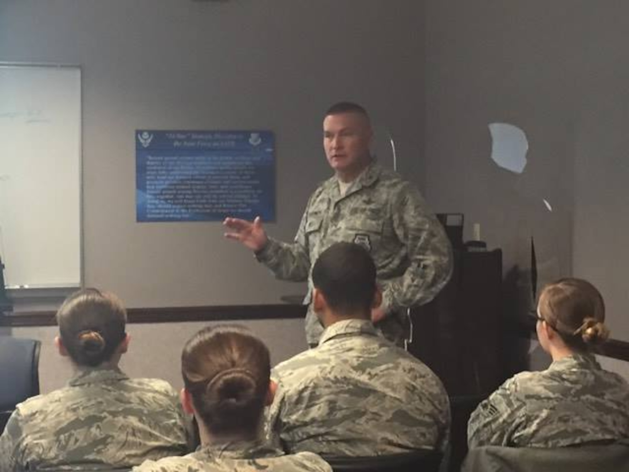 Col. Eric Dorminey, 21st Space Wing vice commander, gives Airmen his top priorities when reviewing packages for promotion under the new Enlisted Force Distribution Process at Peterson Air Force Base, Colo., May 19, 2017. Over 20 Airmen came to a lunch-n-learn seminar to become better leaders for their organization. (U.S. Air Force photo by Alethea Smock)