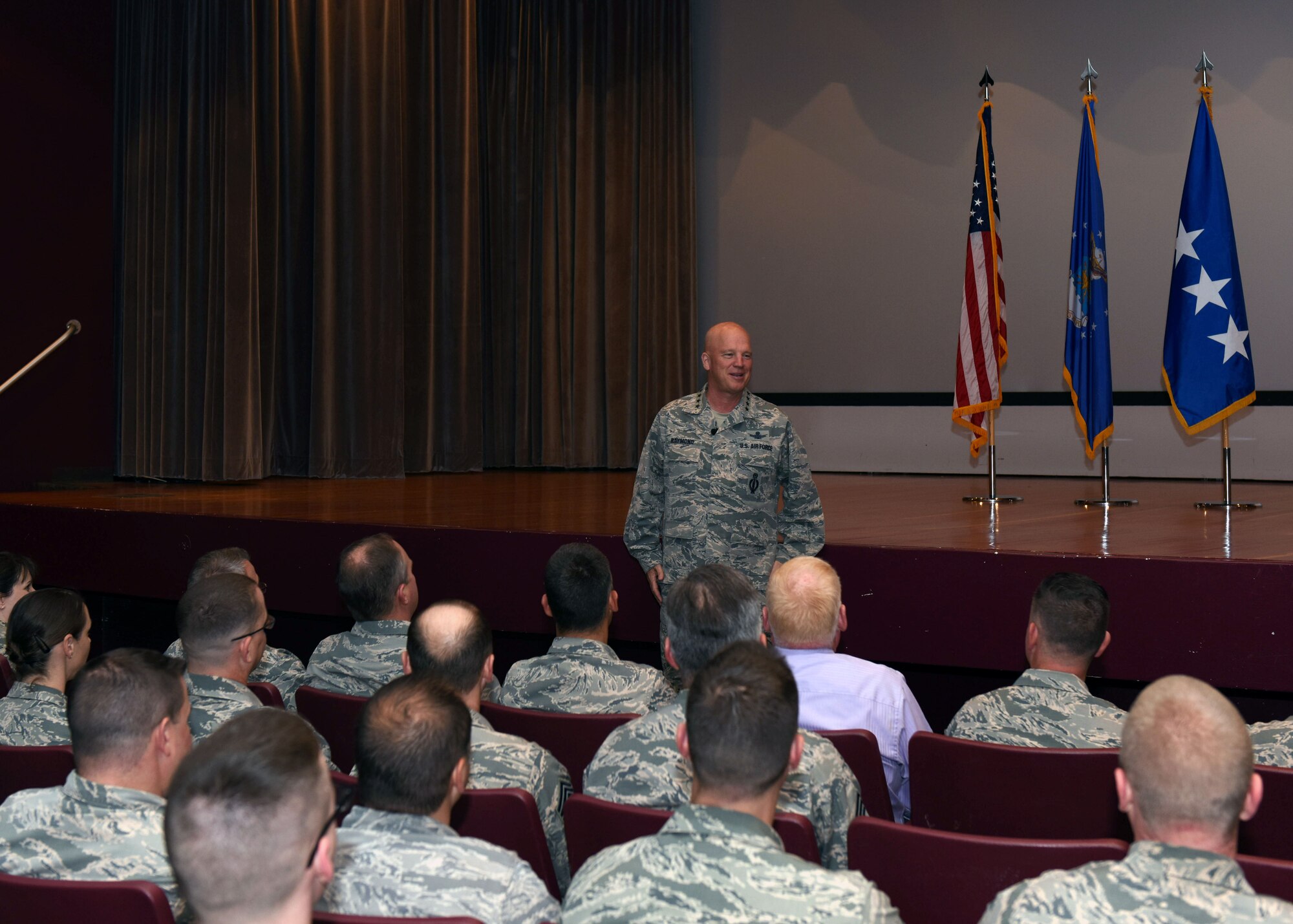 General Jay Raymond, commander of Air Force Space Command, speaks to base personnel during an all call, June 1, 2017, Vandenberg Air Force Base, Calif. In addition to touring and interacting with Airmen from around the base, Raymond held an all call to share his views on future space capabilities and outline his priorities for the command. (U.S. Air Force photo by Senior Airman Kyla Gifford/Released)