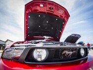 Many Mustang cars were on display during the Eglin Connects event at Eglin Air Force Base, Fla., June 2.  The event to help promote resiliency featured information booths, sporting events and a car show.  (U.S. Air Force photo/Samuel King Jr.)