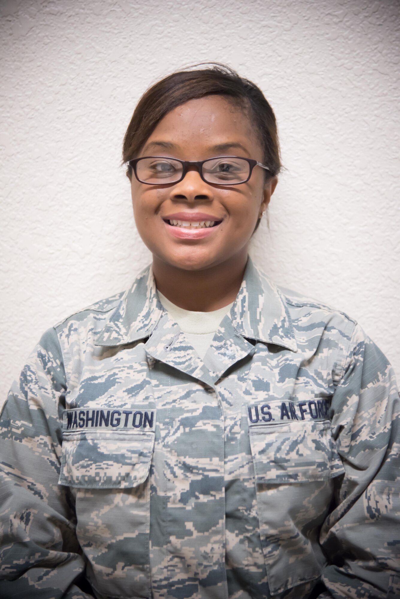 Senior Airman Shirlanna Washington, 403rd Force Support Squadron, poses for a photo after being named Airman of the Quarter June 2, 2017 at Keesler Air Force Base, Mississippi. (U.S. Air Force photo/Staff Sgt. Heather Heiney)