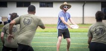 A player looks to pass during an Ultimate Frisbee game that was part of the Eglin Connects event at Eglin Air Force Base, Fla., June 2.  The event to help promote resiliency featured information booths, sporting events and a car show.  (U.S. Air Force photo/Samuel King Jr.)