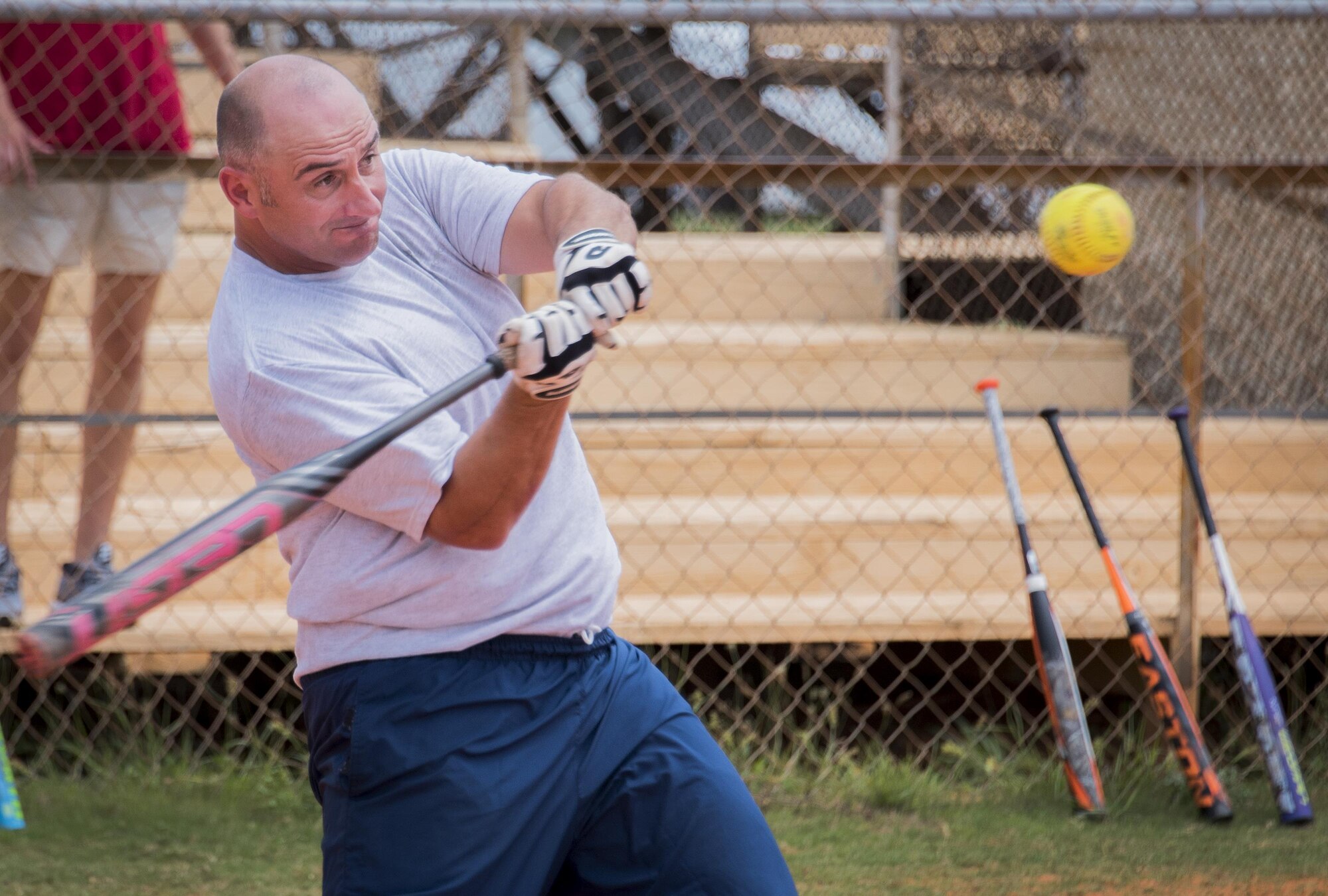 An Airman swings for the fences at the Homerun Derby game that was part of the Eglin Connects event at Eglin Air Force Base, Fla., June 2.  The event to help promote resiliency featured information booths, sporting events and a car show.  (U.S. Air Force photo/Samuel King Jr.)