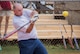 An Airman swings for the fences at the Homerun Derby game that was part of the Eglin Connects event at Eglin Air Force Base, Fla., June 2.  The event to help promote resiliency featured information booths, sporting events and a car show.  (U.S. Air Force photo/Samuel King Jr.)