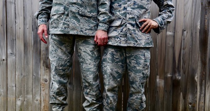 Staff Sgts. Alexx and Chip Pons, who serve separate commands as photojournalists at Joint Base San Antonio-Randolph, Texas, stand united as a married, dual-military, same sex couple. Since the repeal of Don’t Ask, Don’t Tell in 2011 and the legalization of same-sex marriage in 2015, the two have been able to serve openly with the support of their Air Force family. (U.S. Air Force photo/Staff Sgt. Alexx Pons)