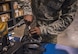 Gas mask fit testing is performed by the 96th Logistics Readiness Squadron's individual protective equipment section.  (U.S. Air Force photo/Ilka Cole)