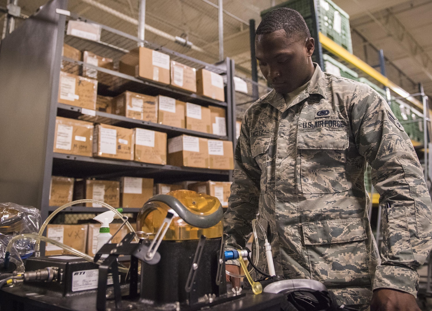 Gas mask fit testing is performed by the 96th Logistics Readiness Squadron's individual protective equipment section.  (U.S. Air Force photo/Ilka Cole)