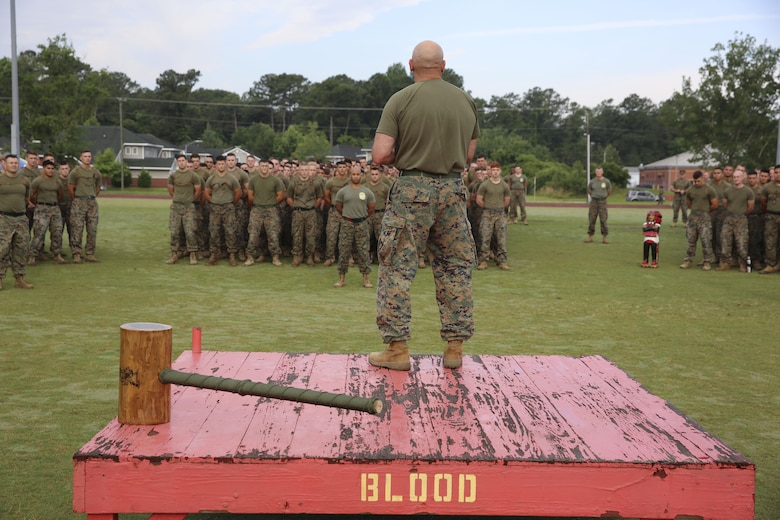Col. Thomas Dodds gives the Marine Air Control Group 28 Marines some motivation before their athletic combine at Marine Corps Air Station Cherry Point, N.C., June 2, 2017. The combine consisted of different physical competitions including a relay race, bench press, javelin throw, pull-ups, tire flip, and Humvee push. Teams of 20 Marines from each squadron within the air control group competed in the combine. Dodds is the commanding officer of MACG-28. (U.S. Marine Corps photo by Lance Cpl. Cody Lemons/Released)