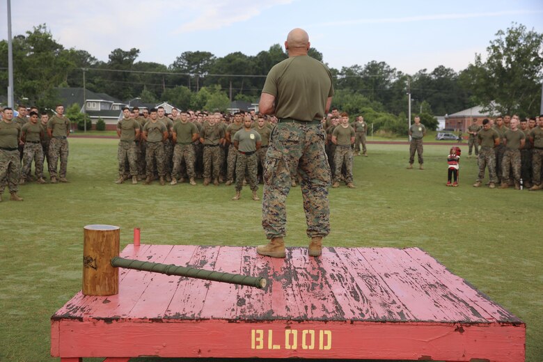 Col. Thomas Dodds gives the Marine Air Control Group 28 Marines some motivation before their athletic combine at Marine Corps Air Station Cherry Point, N.C., June 2, 2017. The combine consisted of different physical competitions including a relay race, bench press, javelin throw, pull-ups, tire flip, and Humvee push. Teams of 20 Marines from each squadron within the air control group competed in the combine. Dodds is the commanding officer of MACG-28. (U.S. Marine Corps photo by Lance Cpl. Cody Lemons/Released)