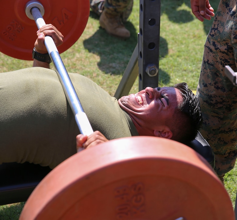 Cpl. Bryant Morillon competes in the bench press competition during a combine hosted by Marine Air Control Group 28 at Marine Corps Air Station Cherry Point, N.C., June 2, 2017.  Teams of 20 Marines from each squadron within the control group competed in multiple events which included a Humvee push, javelin throw and tire flip competition. Morillon is a warehouse clerk assigned to Marine Air Support Squadron 1, MACG-28, 2nd Marine Aircraft Wing. (U.S. Marine Corps photo by Lance Cpl. Cody Lemons/Released)