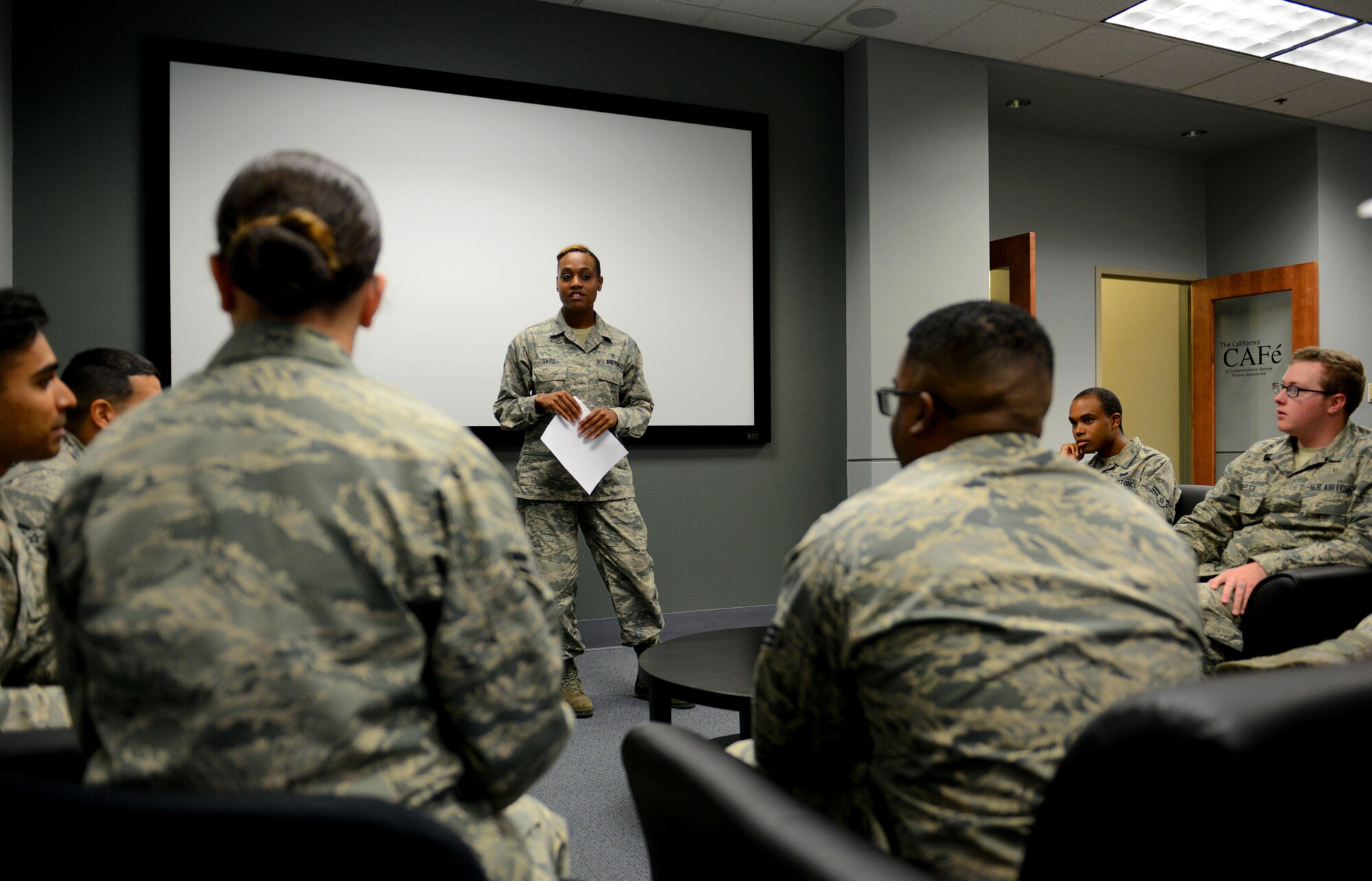 Senior Airman Ashley Davis, 9th Aerospace Medicine Squadron bioenvironmental technician speaks at a meeting for the organization A.C.E or “Airman Committed to Excellence” at Beale AFB, California May 31, 2017. The purpose of ACE is to bring together Airmen from across the base to network both professionally and socially with the goal of building better bonds as Wingmen. (U.S. Air Force photo/Staff Sgt. Jeffrey Schultze)