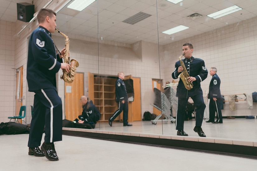 Tech. Sgt. Michael Cemprola, U.S. Air Force Band’s Airmen of Note saxophonist, plays his instrument prior to a performance at the Fine Arts Auditorium in Savannah, Ga., May 26, 2017. The band performed for more than 8,000 people over the course of their tour throughout Georgia and Florida. (U.S. Air Force photo by Senior Airman Delano Scott)