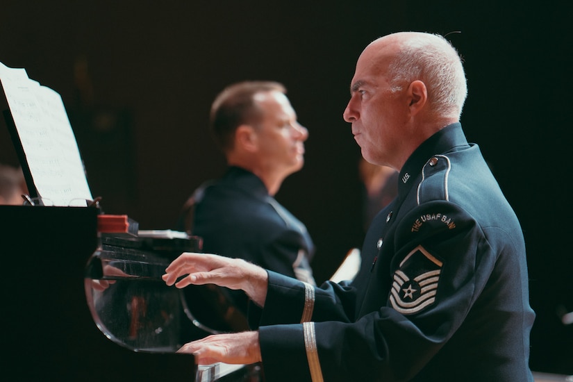 Master Sgt. Steven D. Erickson, U.S. Air Force Band’s Airmen of Note pianist, performs at the Fine Arts Auditorium in Savannah, Ga., May 26, 2017. The band played a variety of contemporary jazz pieces throughout each performance, all having a distinctive tie to the armed forces. Each piece of music was written, arranged or performed by service members. (U.S. Air Force photo by Senior Airman Delano Scott)