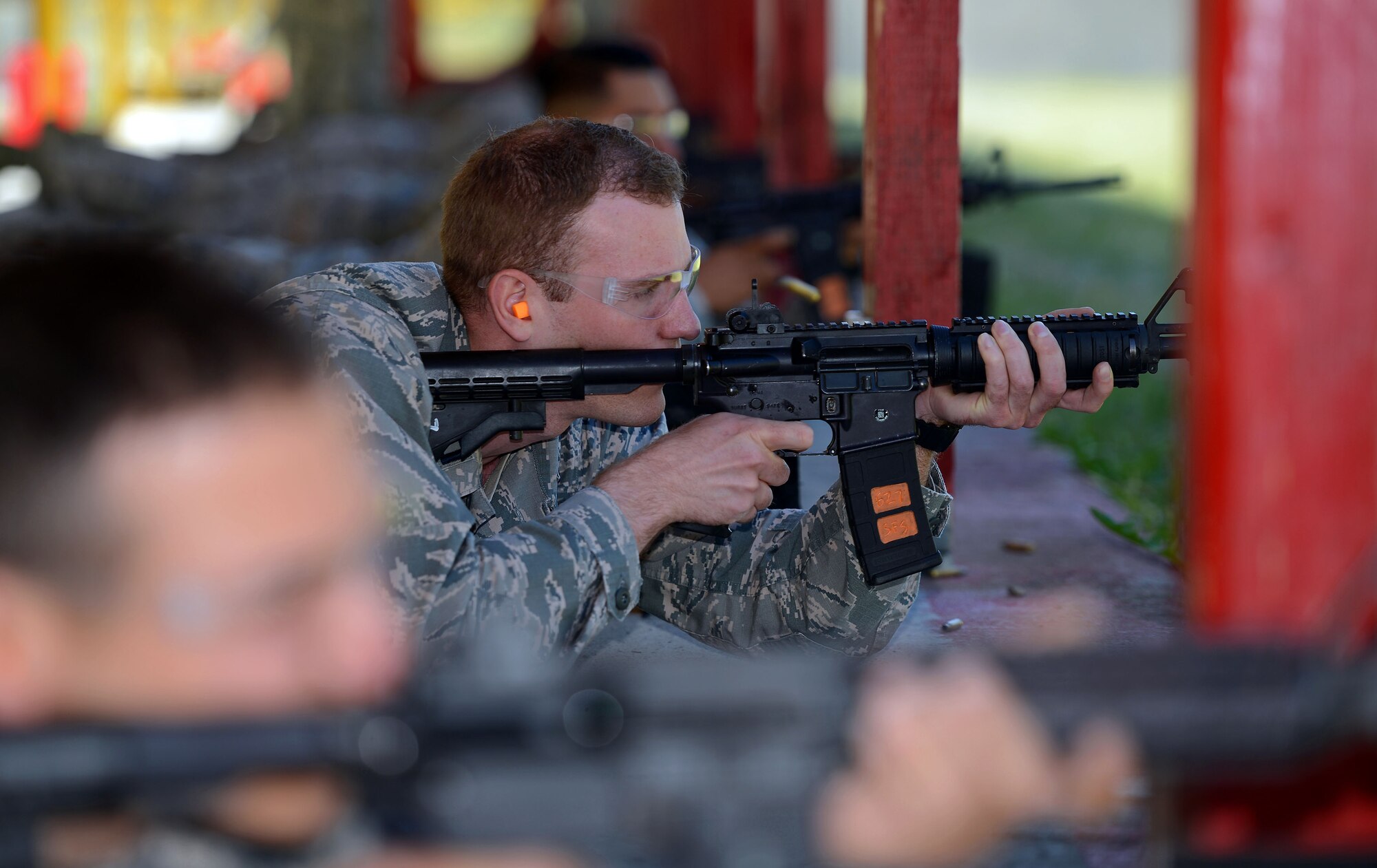 Capt. Ryan Sample, 62nd Airlift Wing assistant staff judge advocate, fires at a target from the prone position during the Elementary Level Rifle Excellence Competition May 31, 2017, at Joint Base Lewis-McChord, Wash. The competition was hosted in the same manner as marksmen competitions and instructors were not allowed to assist shooters or provide tips. (U. S. Air Force photo/Senior Airman Jacob Jimenez) 