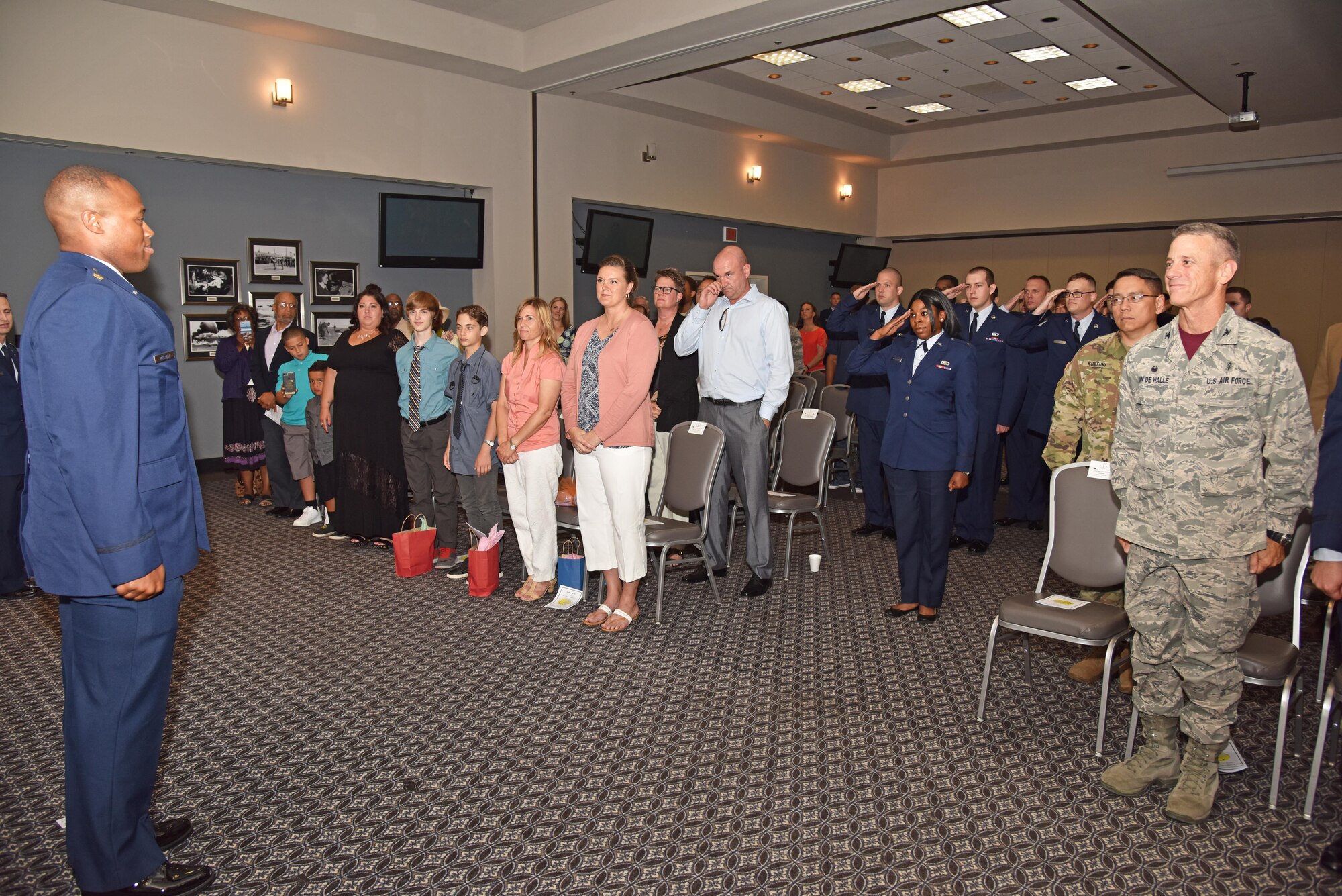 17th Comptroller Squadron salutes U.S. Air Force Maj. Nelson Mitchell, new 17th CPTS Commander, during the 17th CPTS Change of Command ceremony at the Event Center on Goodfellow Air Force Base, Texas, June 2, 2017. During the ceremony the unit salutes the departing commander for the last time and the incoming commander for the first time. (U.S. Air Force photo by Staff Sgt. Joshua Edwards/Released)