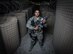 U.S. Air National Guard Staff Sgt. Neil Carranza, a personnel search area lead with the 407th Expeditionary Security Forces Squadron, stands for a photo May 10, 2017, at the 407th Air Expeditionary Group. As a screener, Carranza ensures only authorized individuals are gaining access to the installation and checks for contraband, drugs or illegal items. Carranza, a traditional guardsman with the 254th Security Forces Squadron at Andersen Air Force Base, Guam, deployed in support of Operation Inherent Resolve. (U.S. Air Force photo by Staff Sgt. Alexander W. Riedel)