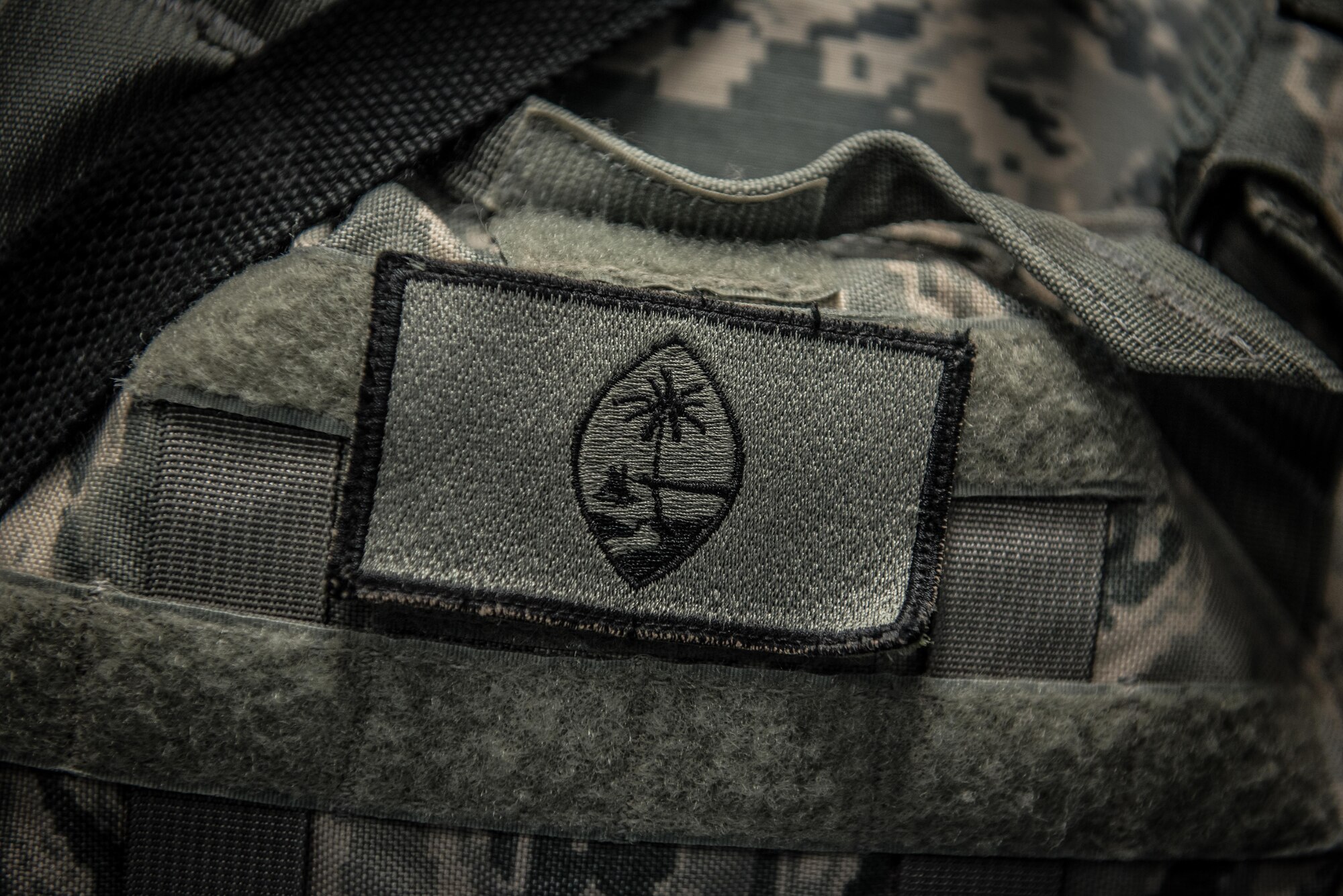U.S. Air National Guard Tech. Sgt. Casey Morrison, a patrol team lead with the 407th Expeditionary Security forces Squadron, wears a small Guam flag patch on her tactical vest May 13, 2017, in Southwest Asia. Morrison is a traditional guardsman and deployed with a team from the 254th Security Forces Squadron in support of Operation Inherent Resolve. (U.S. Air Force photo by Staff Sgt. Alexander W. Riedel)